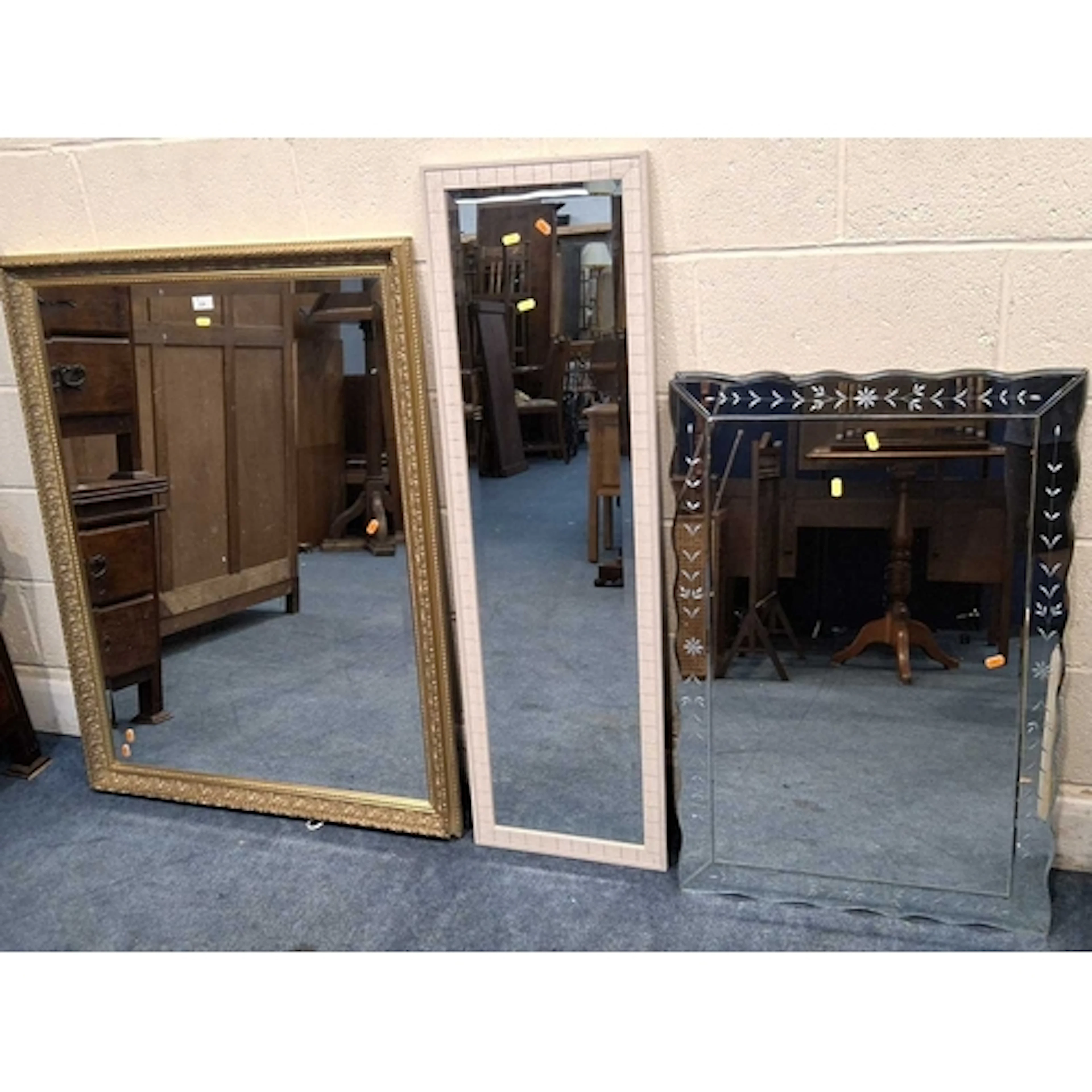 A GILT WOOD RECTANGULAR BEVELLED EDGE WALL MIRROR, another r...