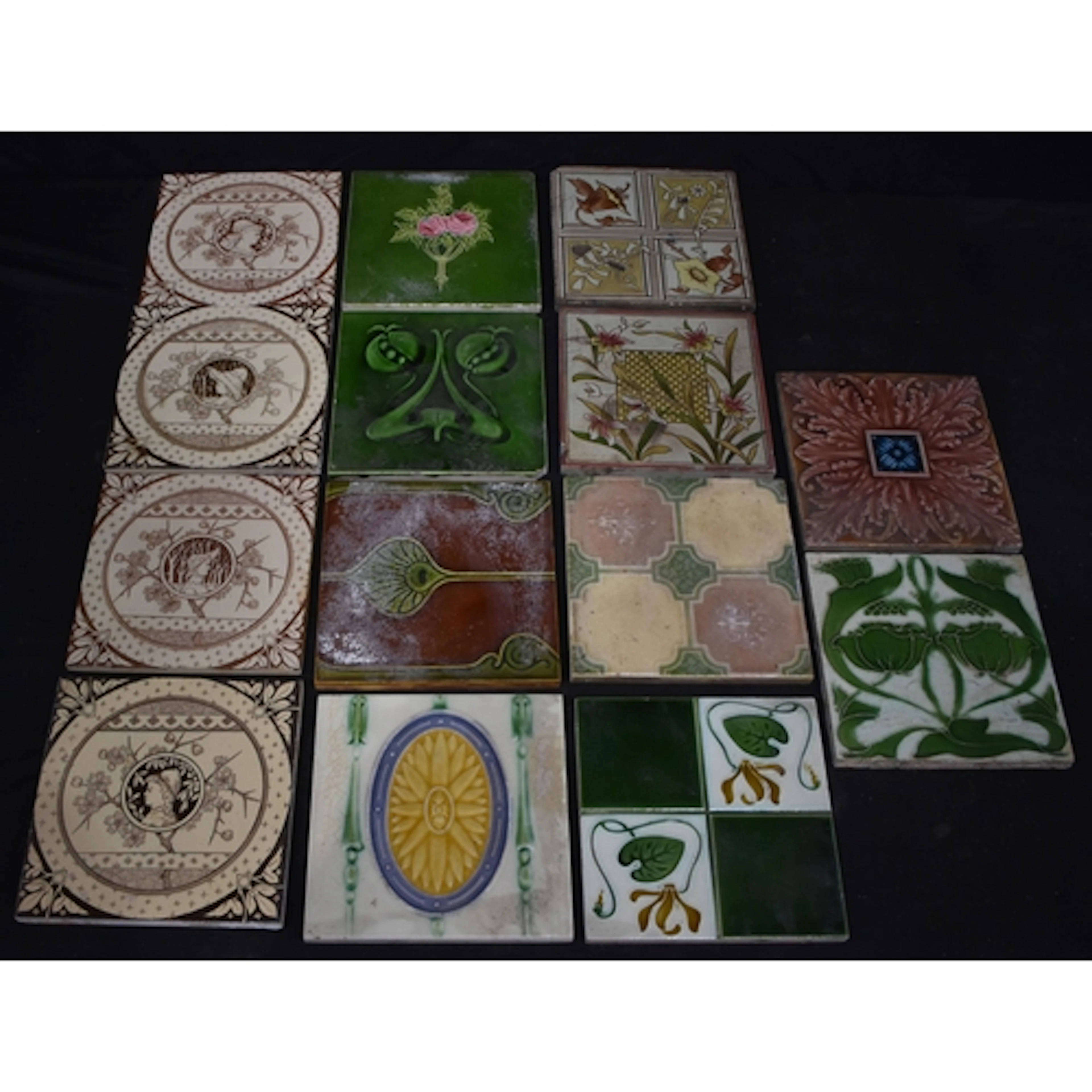 A collection of Victorian ceramic tiles 15 x 15cm (14)