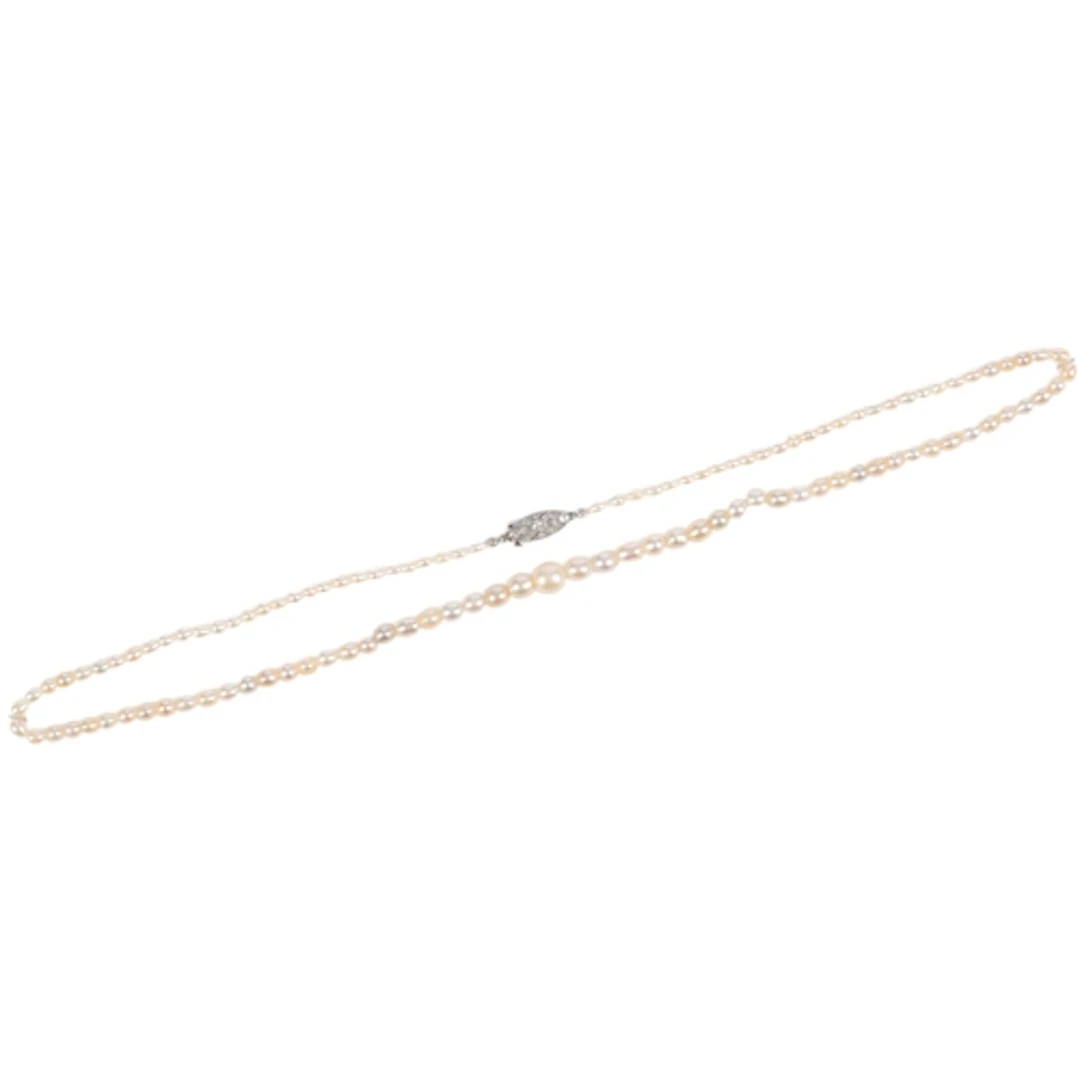 A natural pearl necklace, early 20th century, composed of a ...