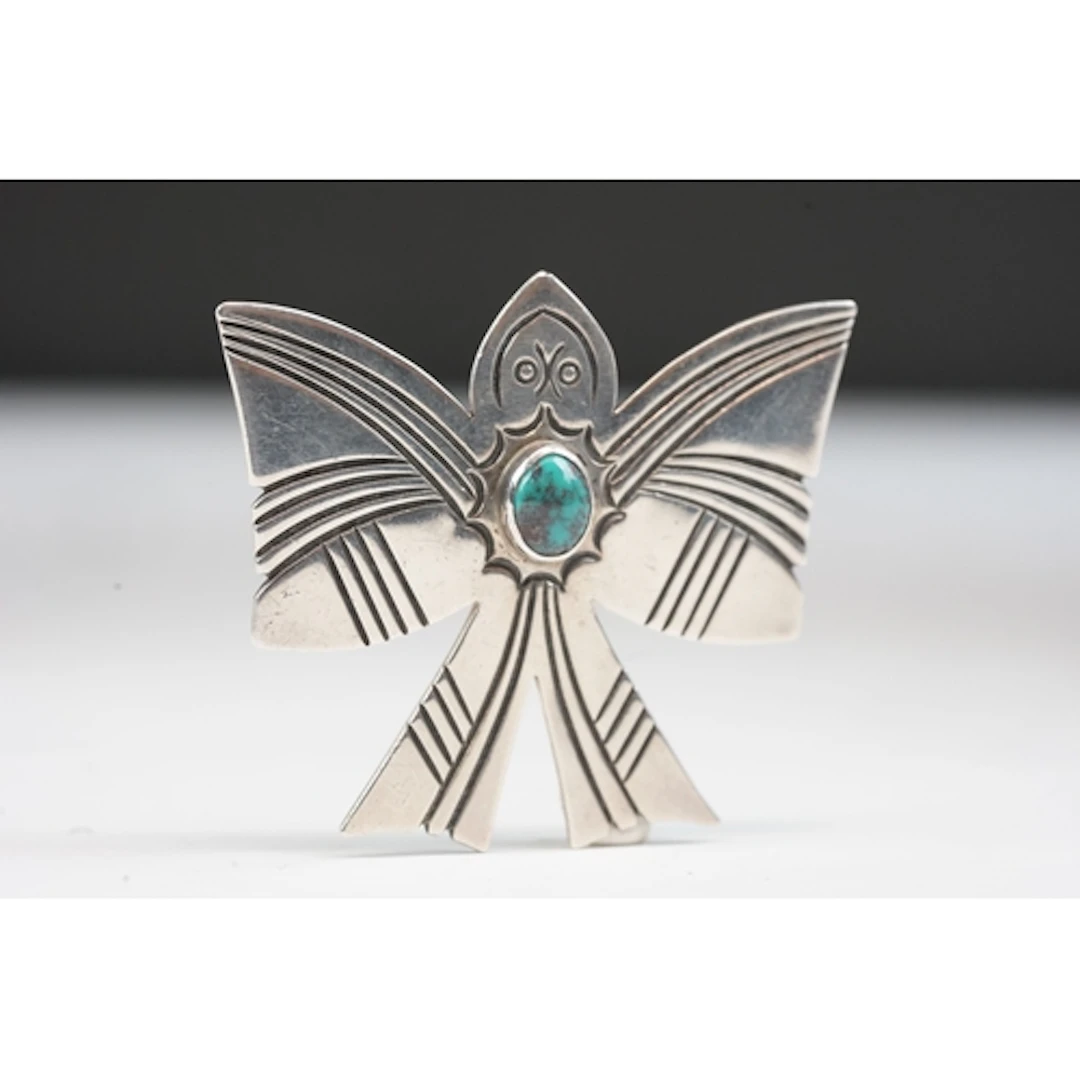 A Genuine sterling silver and Turquoise Navajo Thunderbird b...