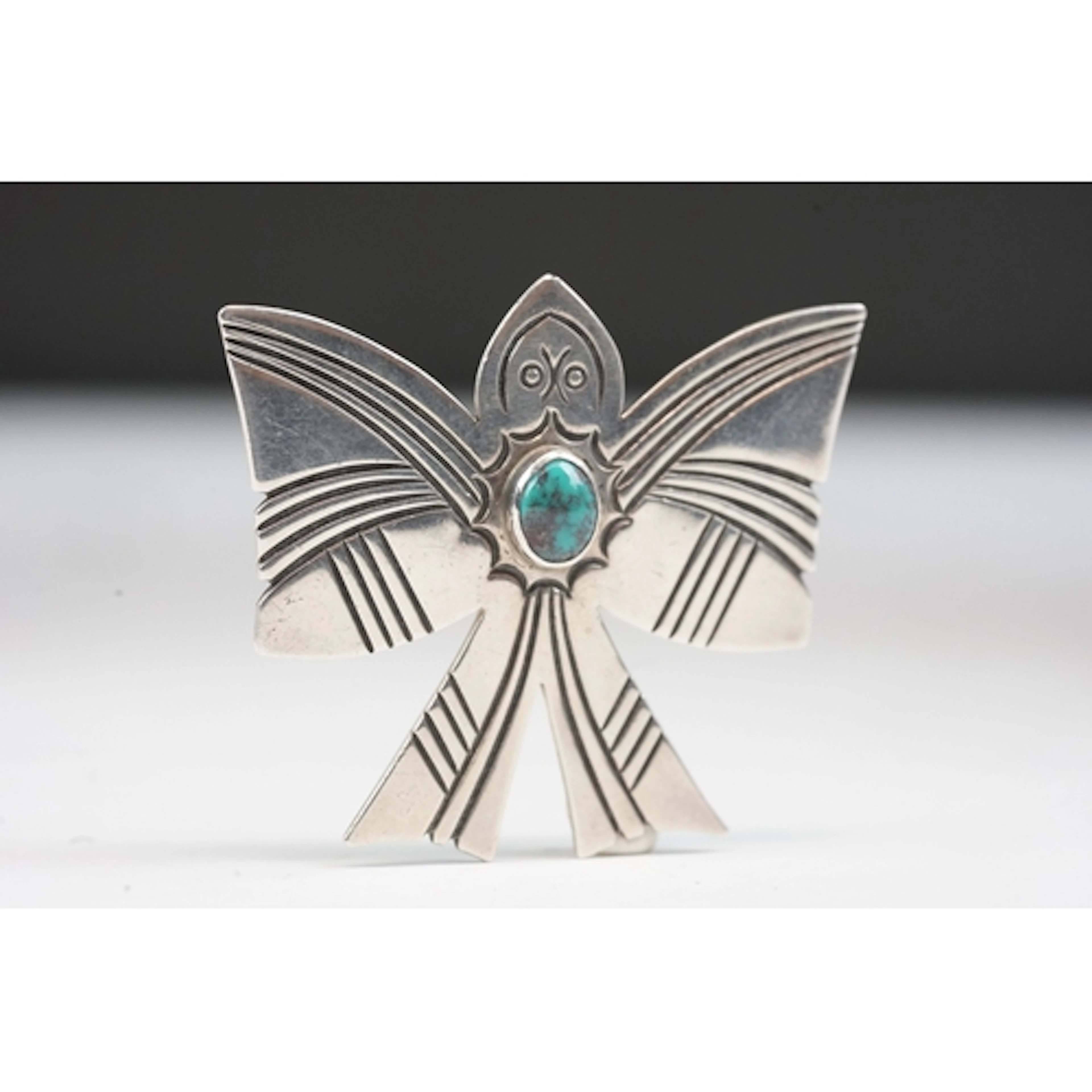 A Genuine sterling silver and Turquoise Navajo Thunderbird b...