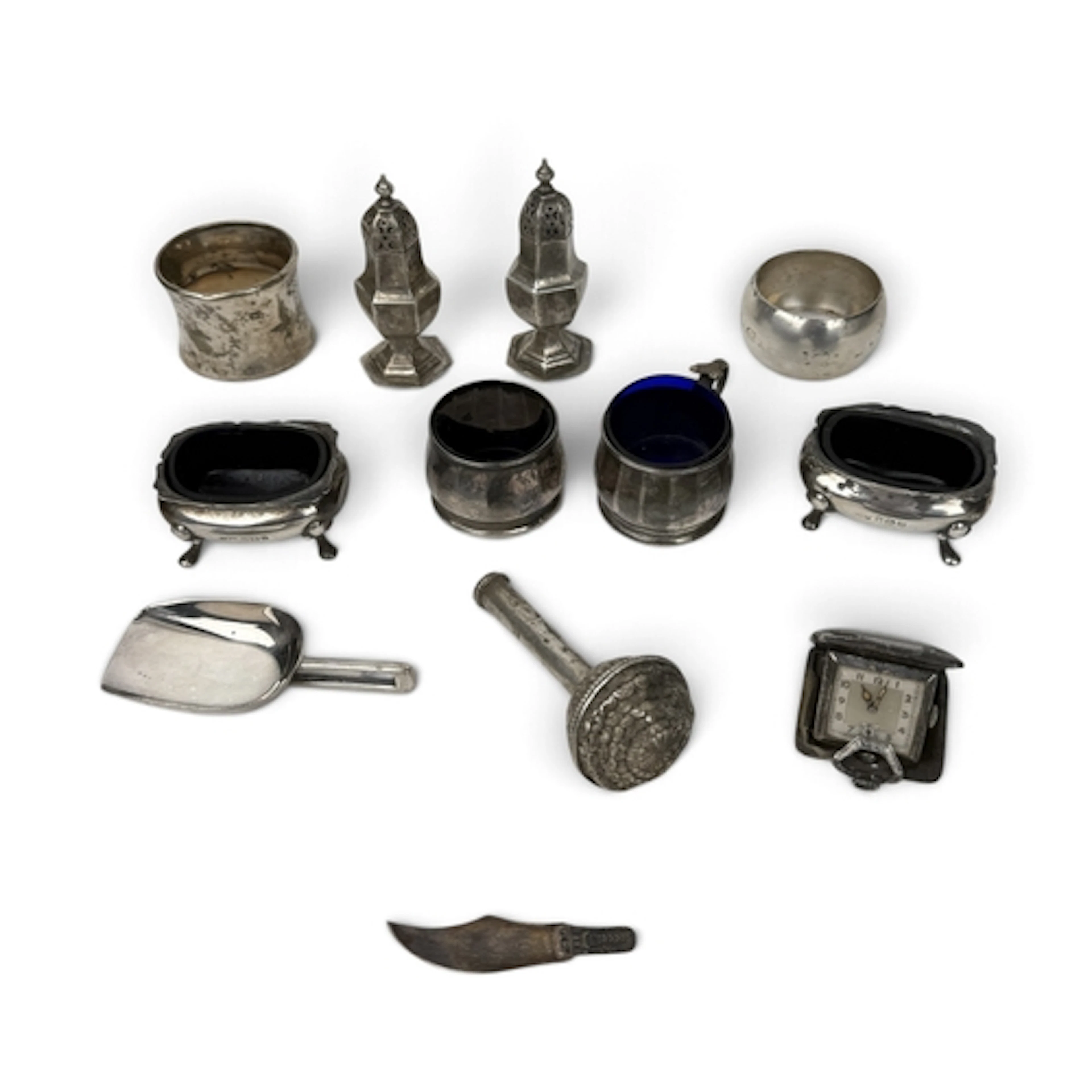 A GROUP OF SILVER TO INCLUDE A PAIR OF SALT SHAKERS Together...