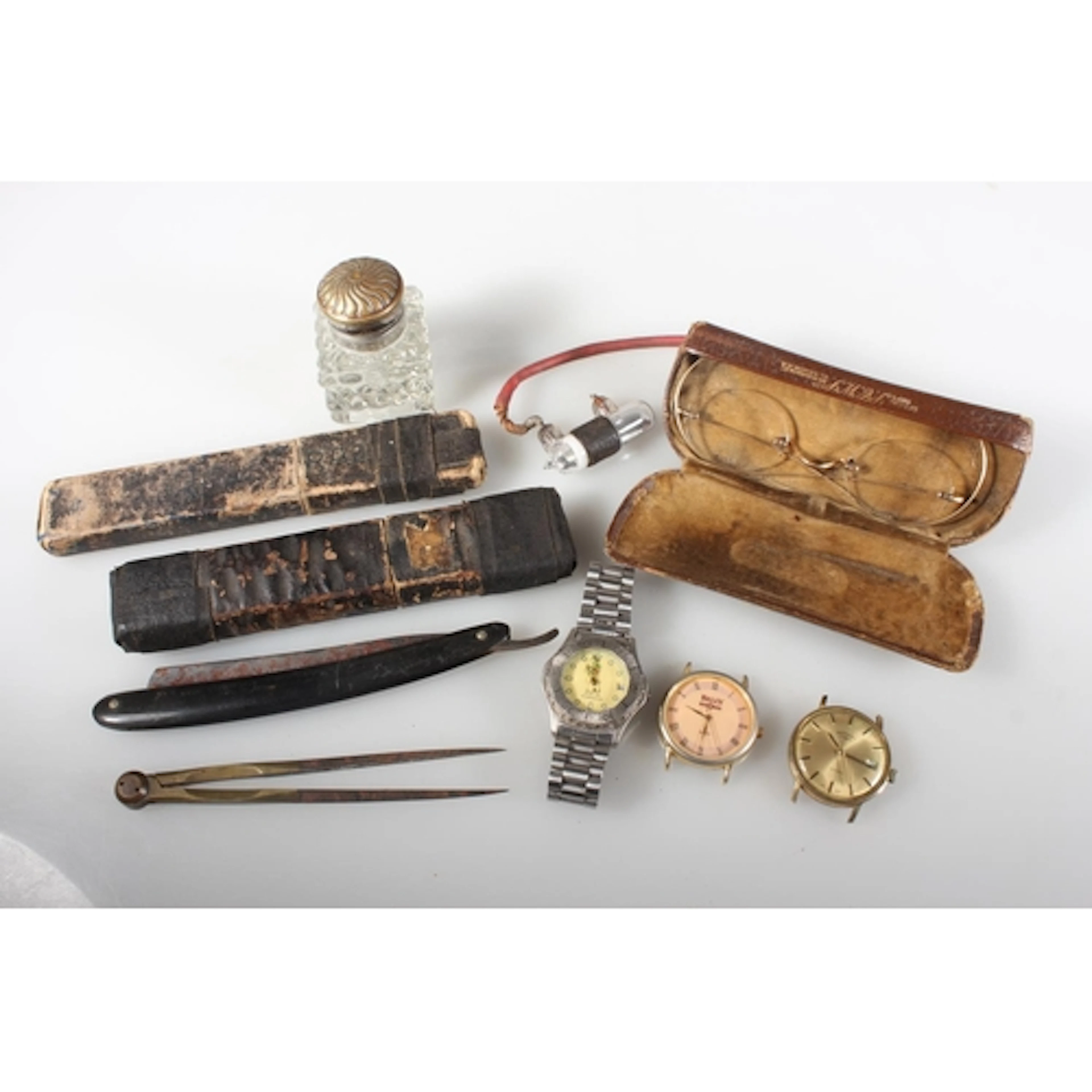 A glass inkwell, various razors, Rotary wristwatch, Tag Heue...