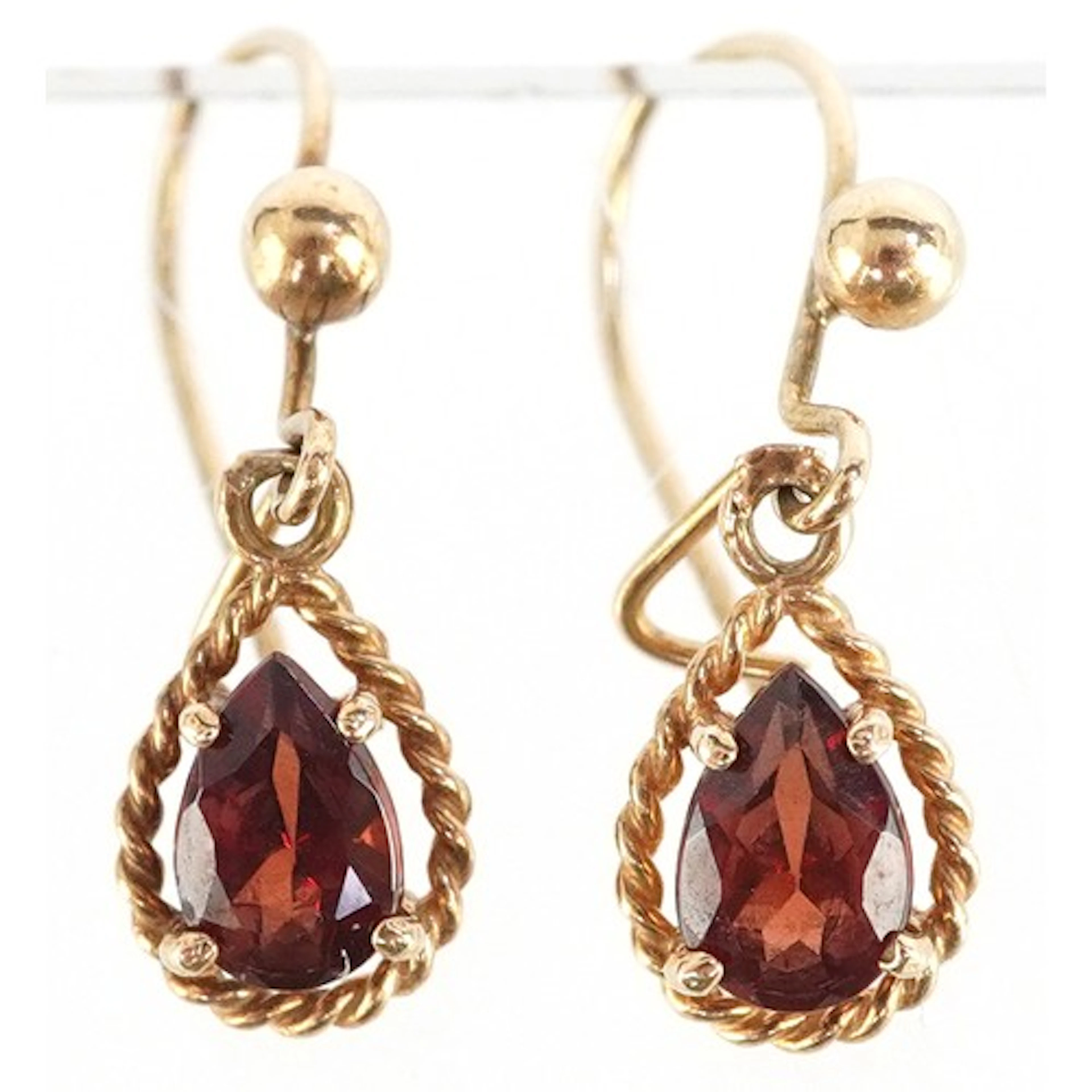 Pair of yellow metal garnet drop earrings, 2.4cm high, total...