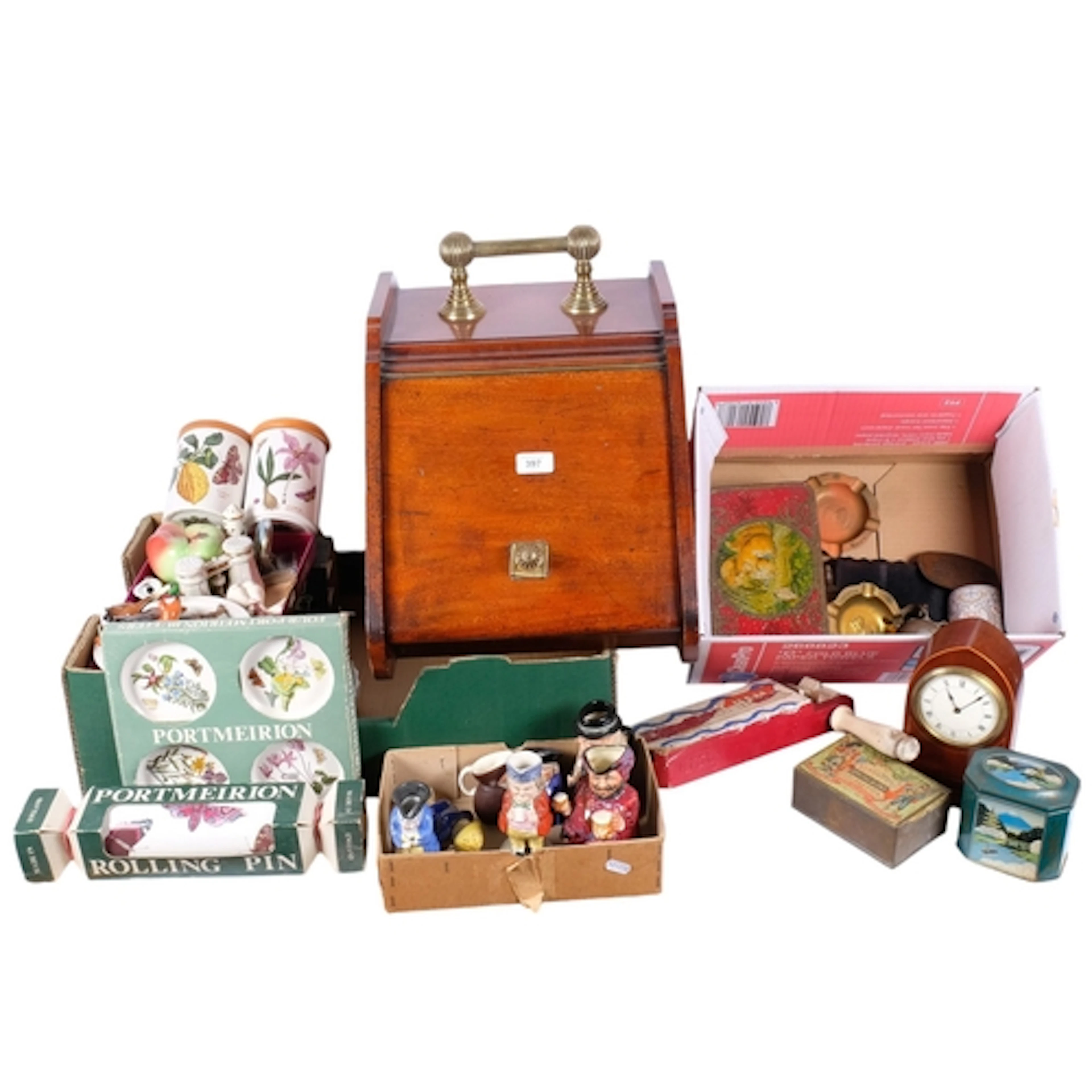 A collection of Vintage tins, a lancet-top inlaid mantel clo...