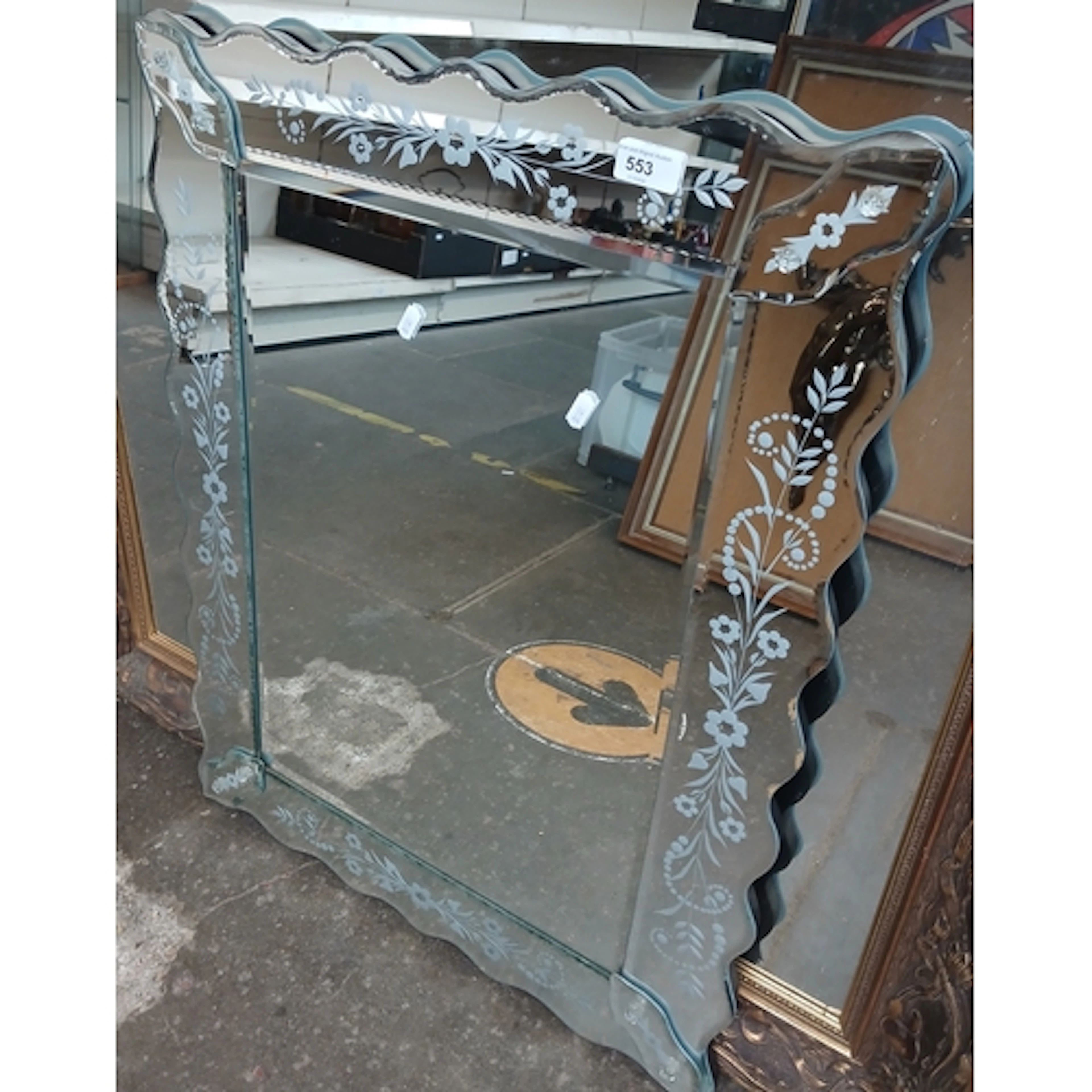 A Laura Ashley style mirror 74cm x 56cm.