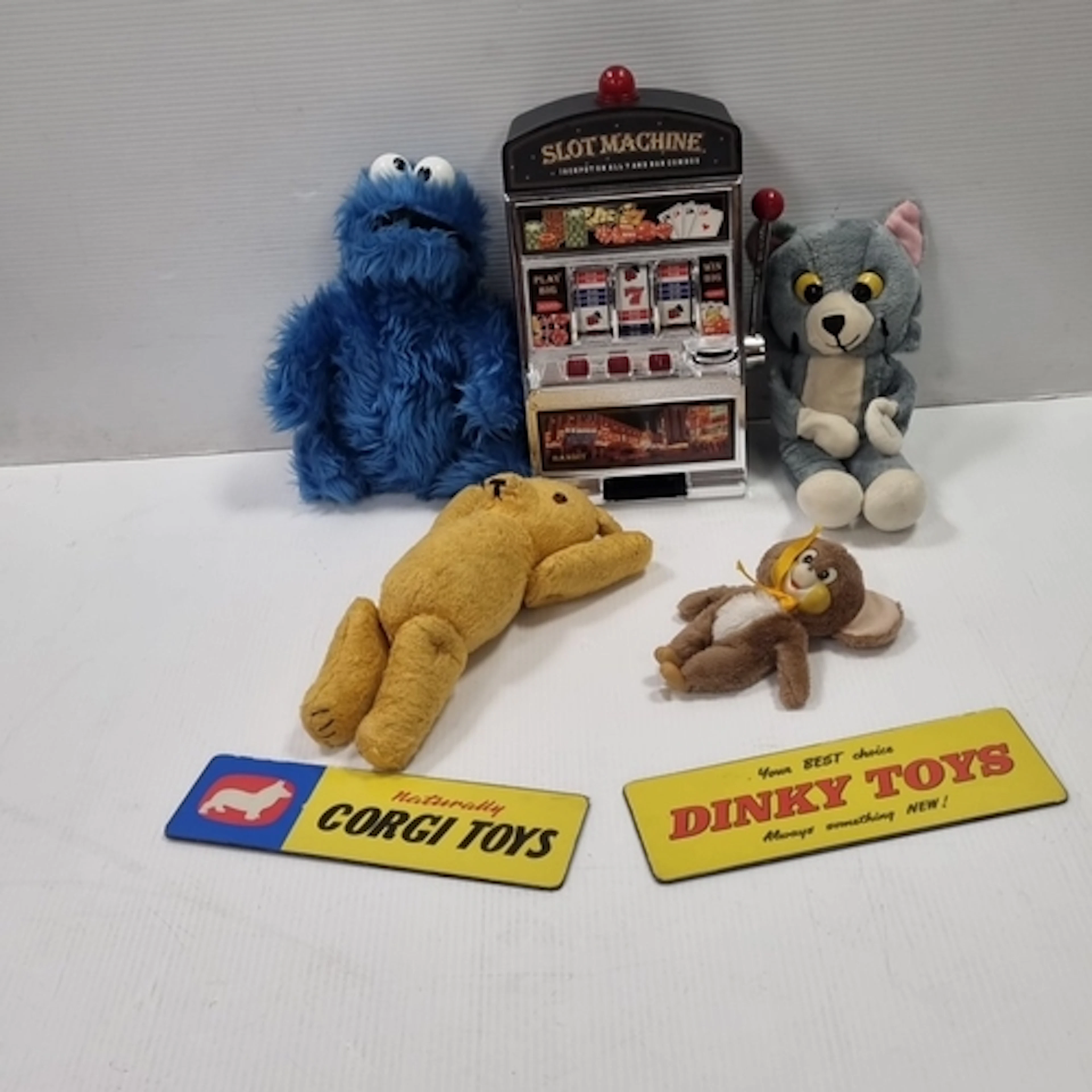 Assorted soft toys with novelty toy slot machine and two box...
