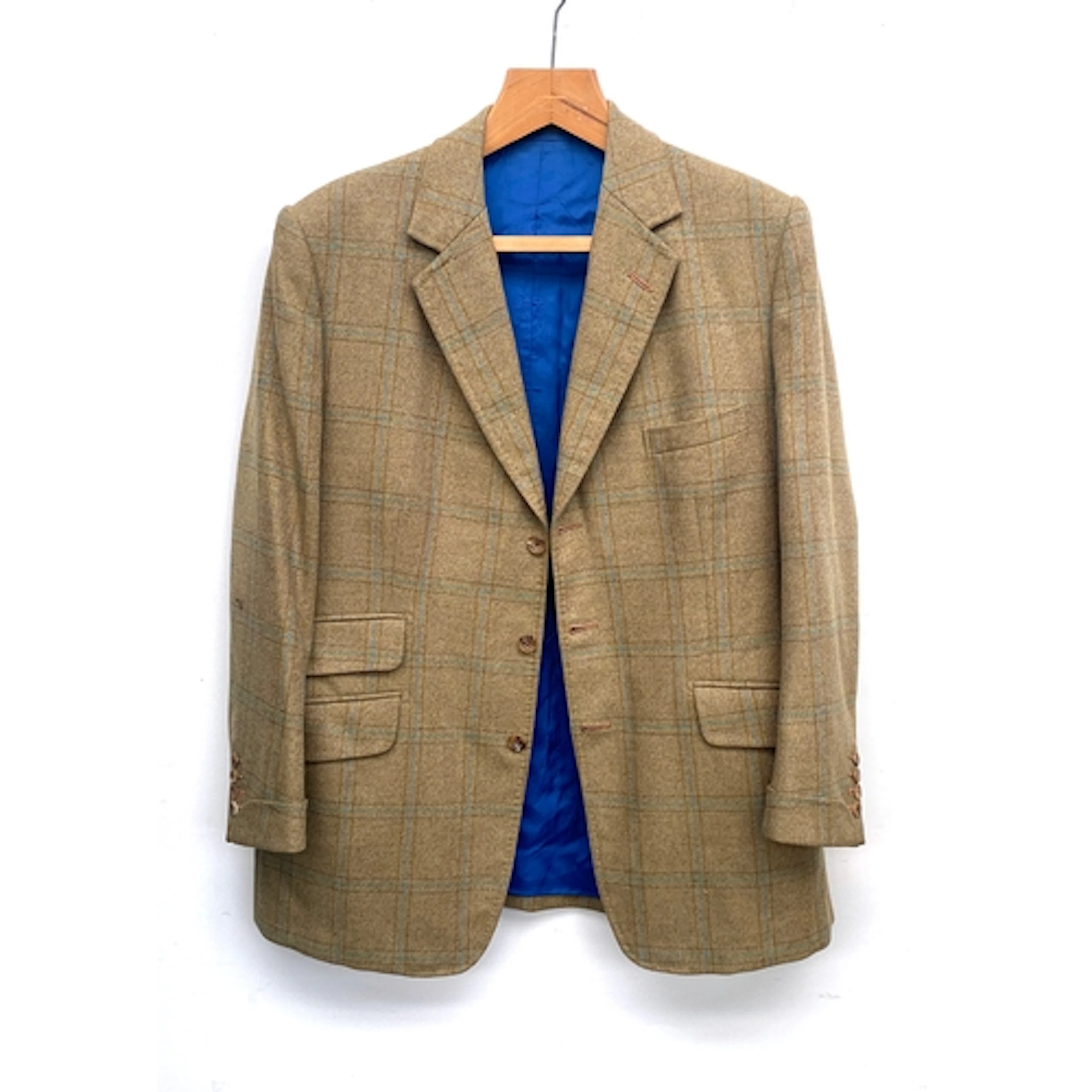 A single breasted tweed jacket with turned cuffs by Davies &...