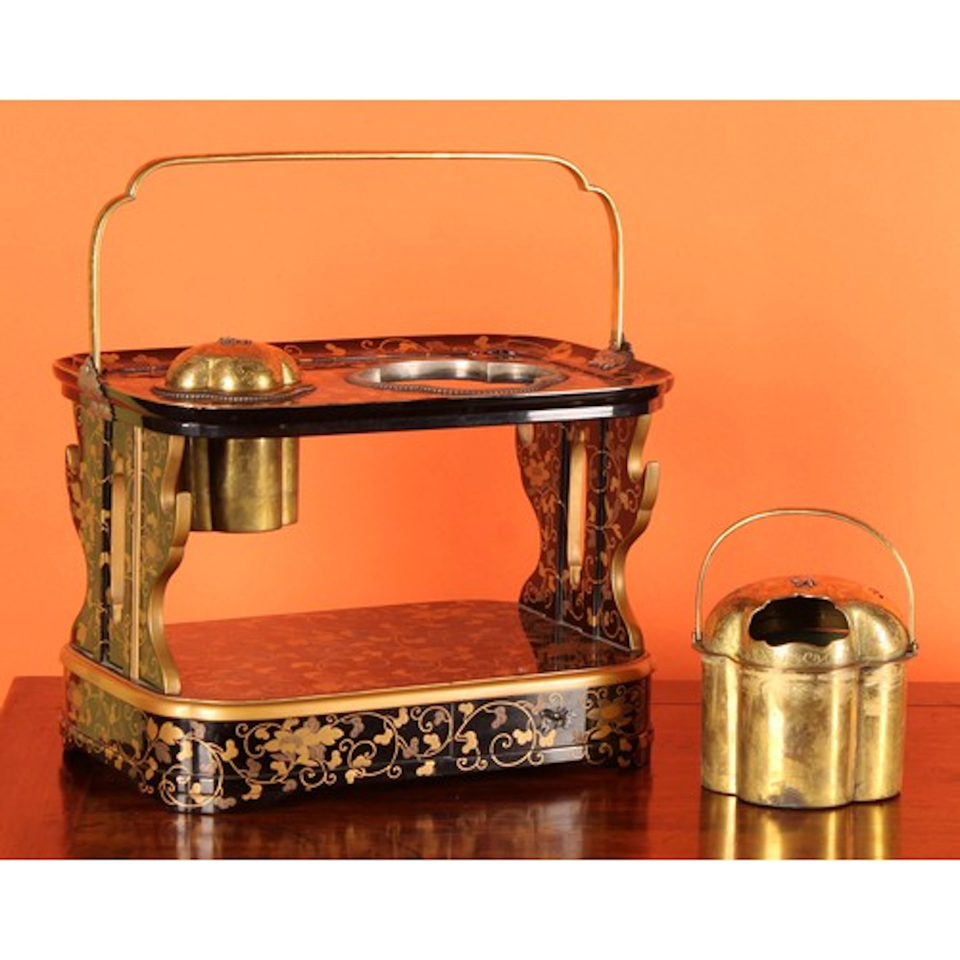 A Japanese silver and brass mounted lacquer Tobako-bon, prof...