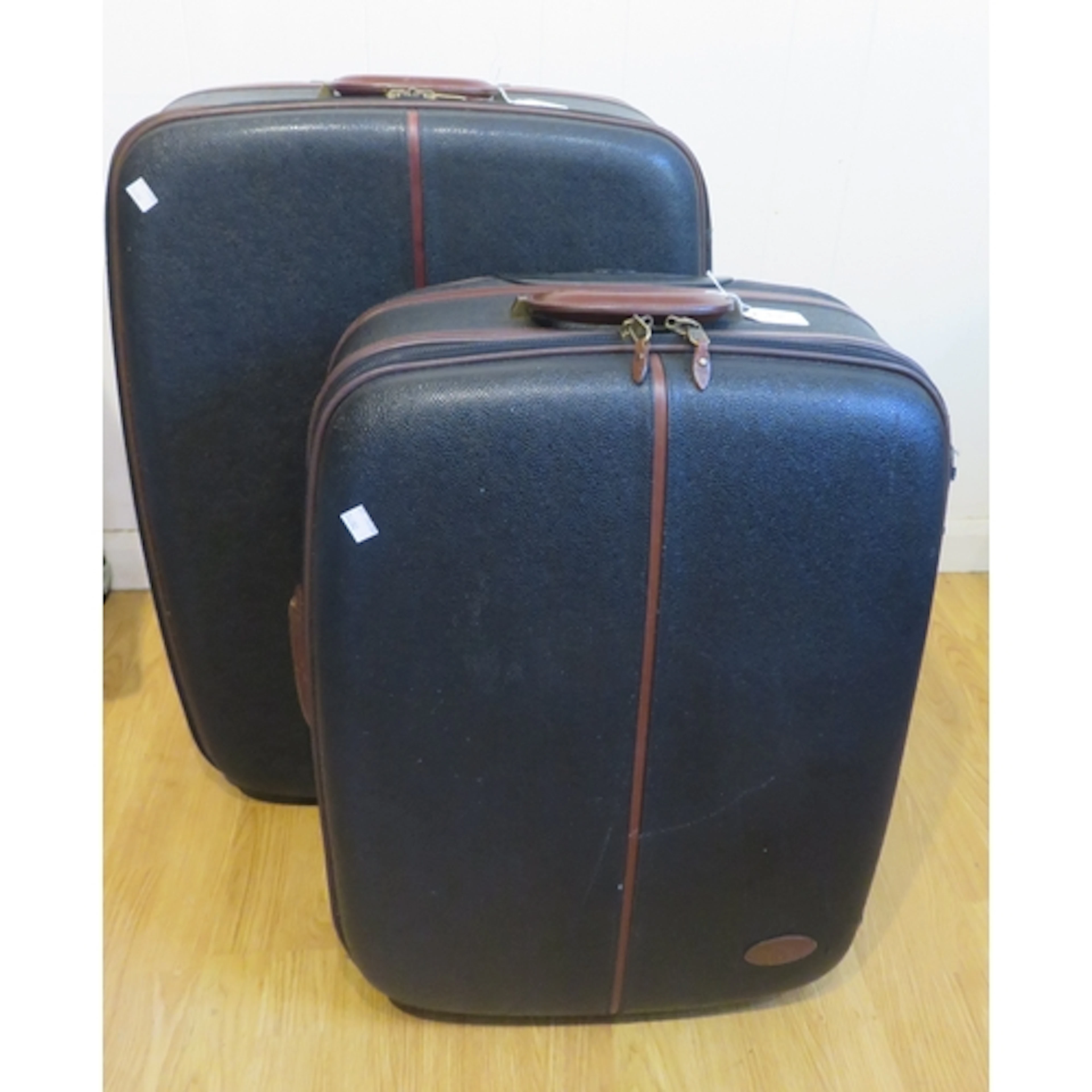 Burberry simulated leather suitcase, together with another m...