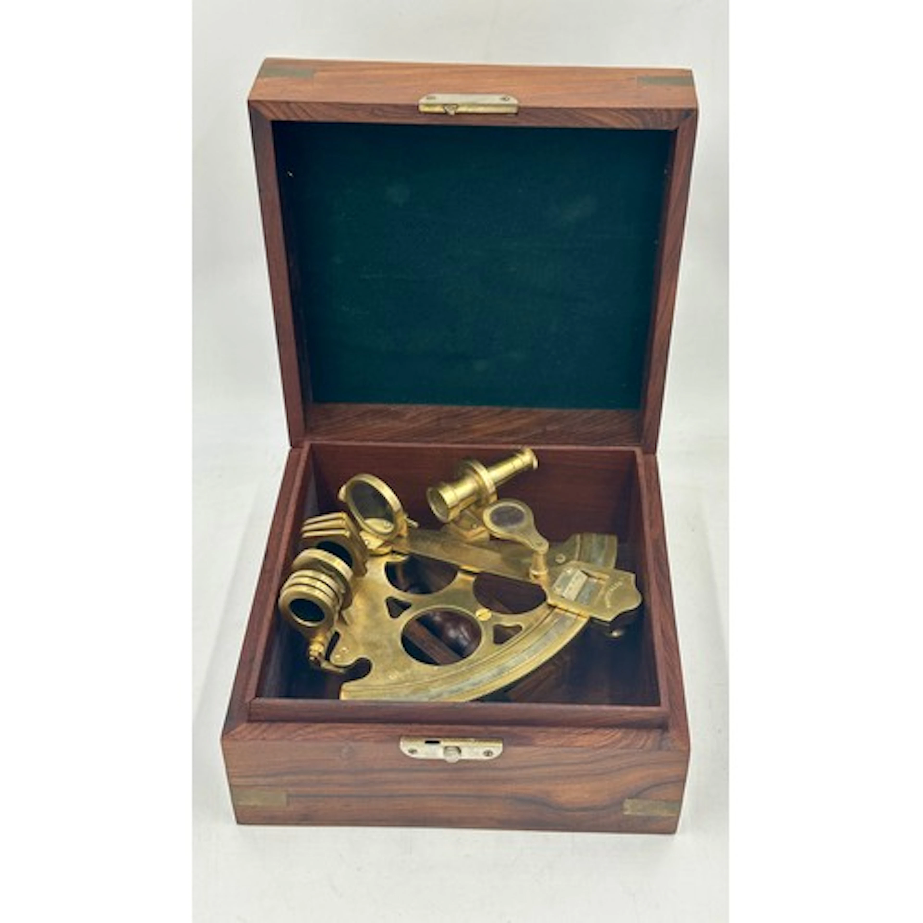 A Nauticalia brass sextant in a brass bound wooden box. Appr...