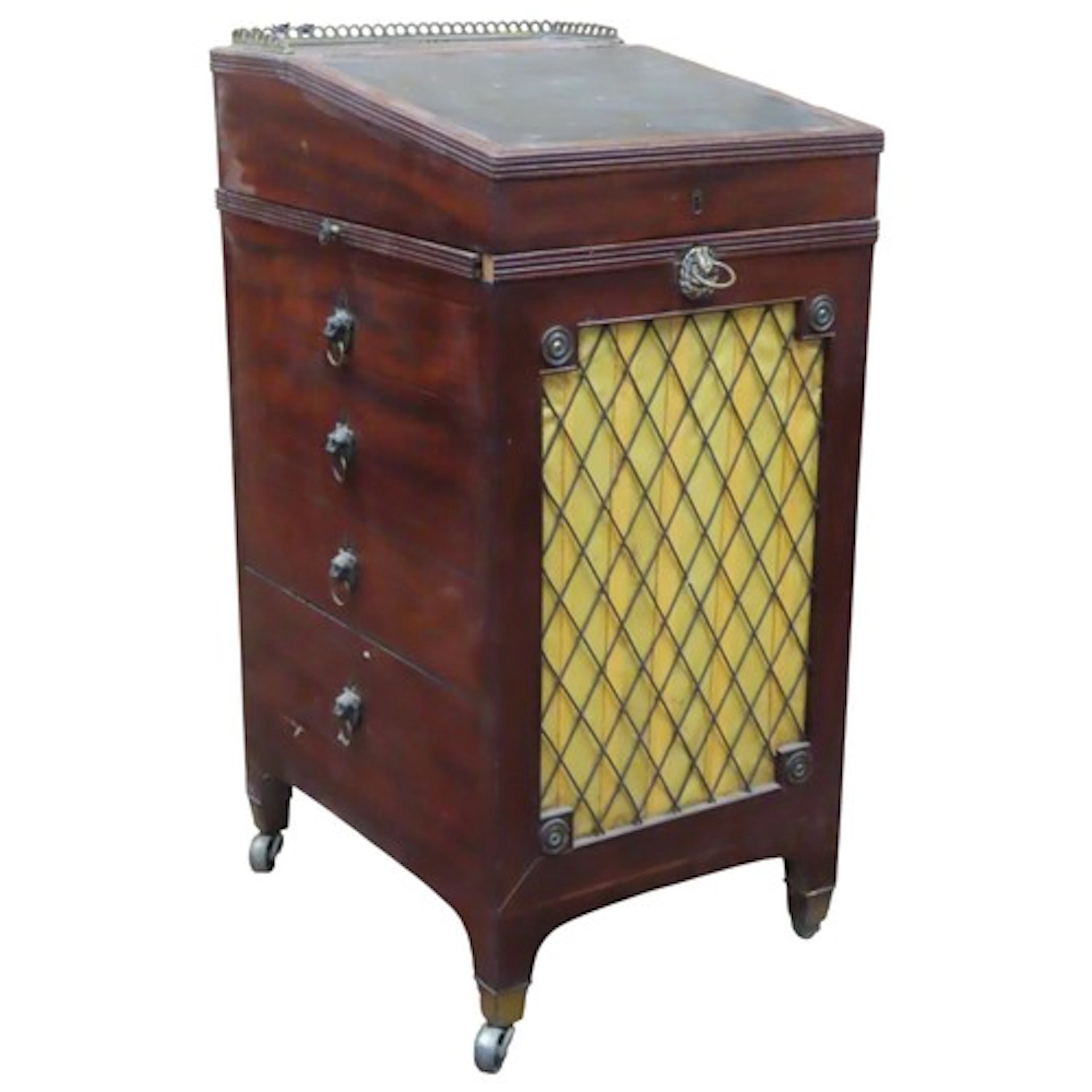 An unusually small Regency mahogany davenport with detachabl...