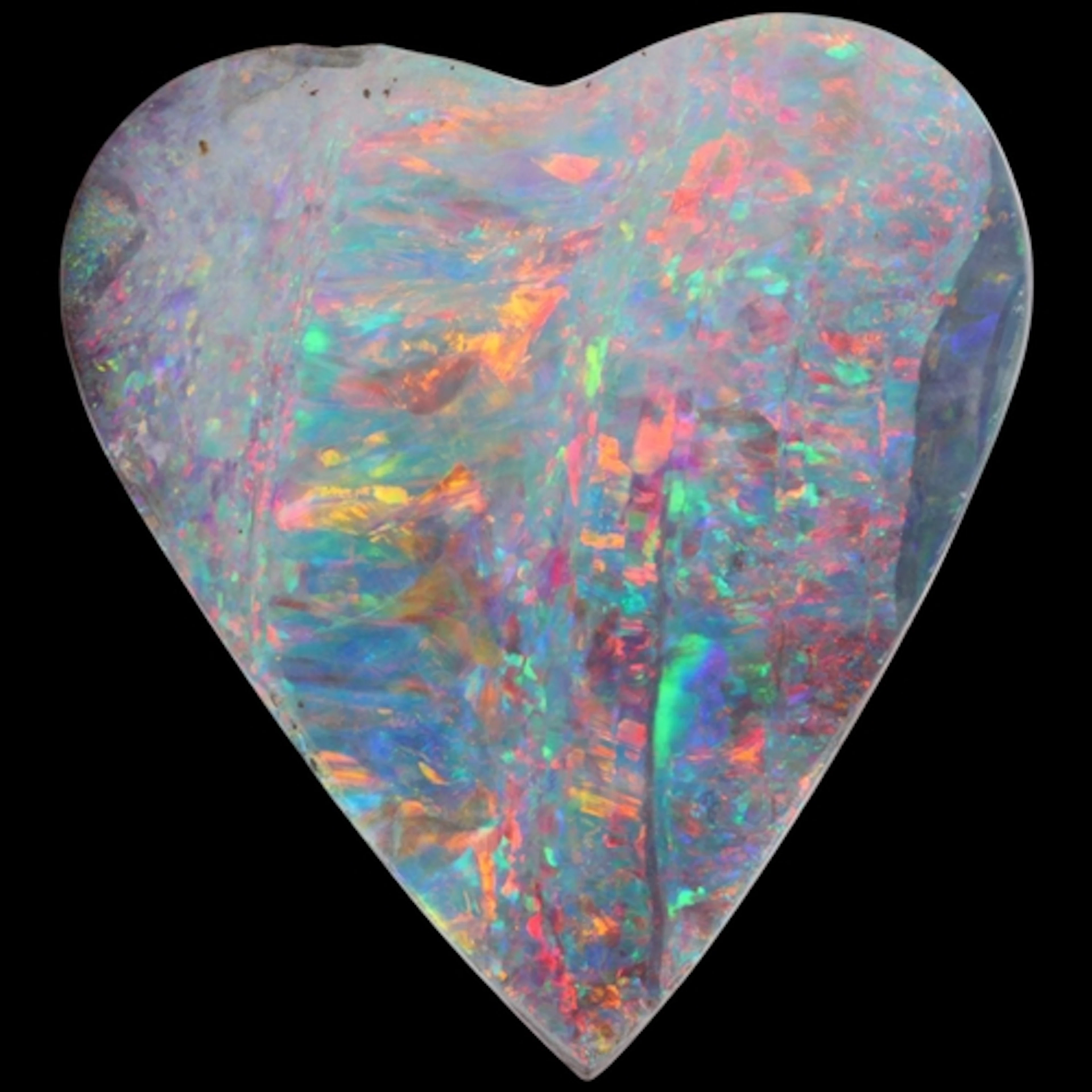 An unmounted heart-shape boulder opal, 25.4 x 23.1 x 5.1mm, ...