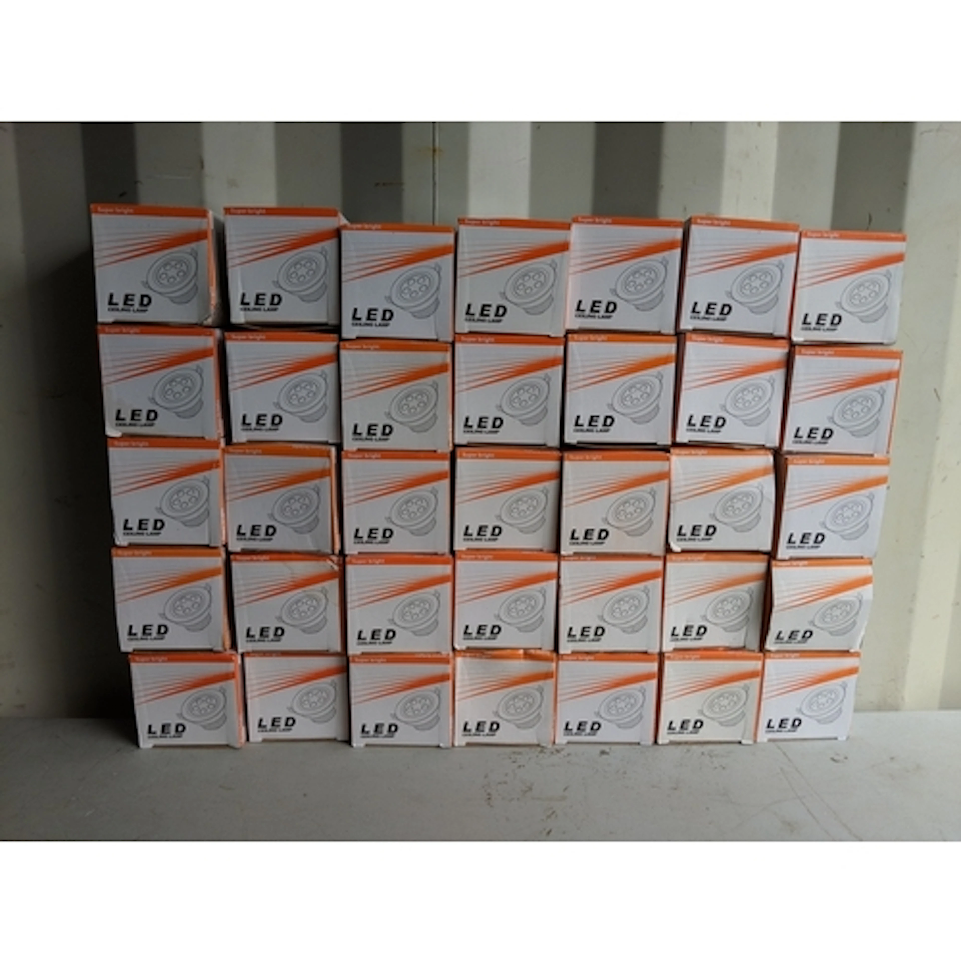 Thirty-five unused boxed circular LED ceiling lamps Location...