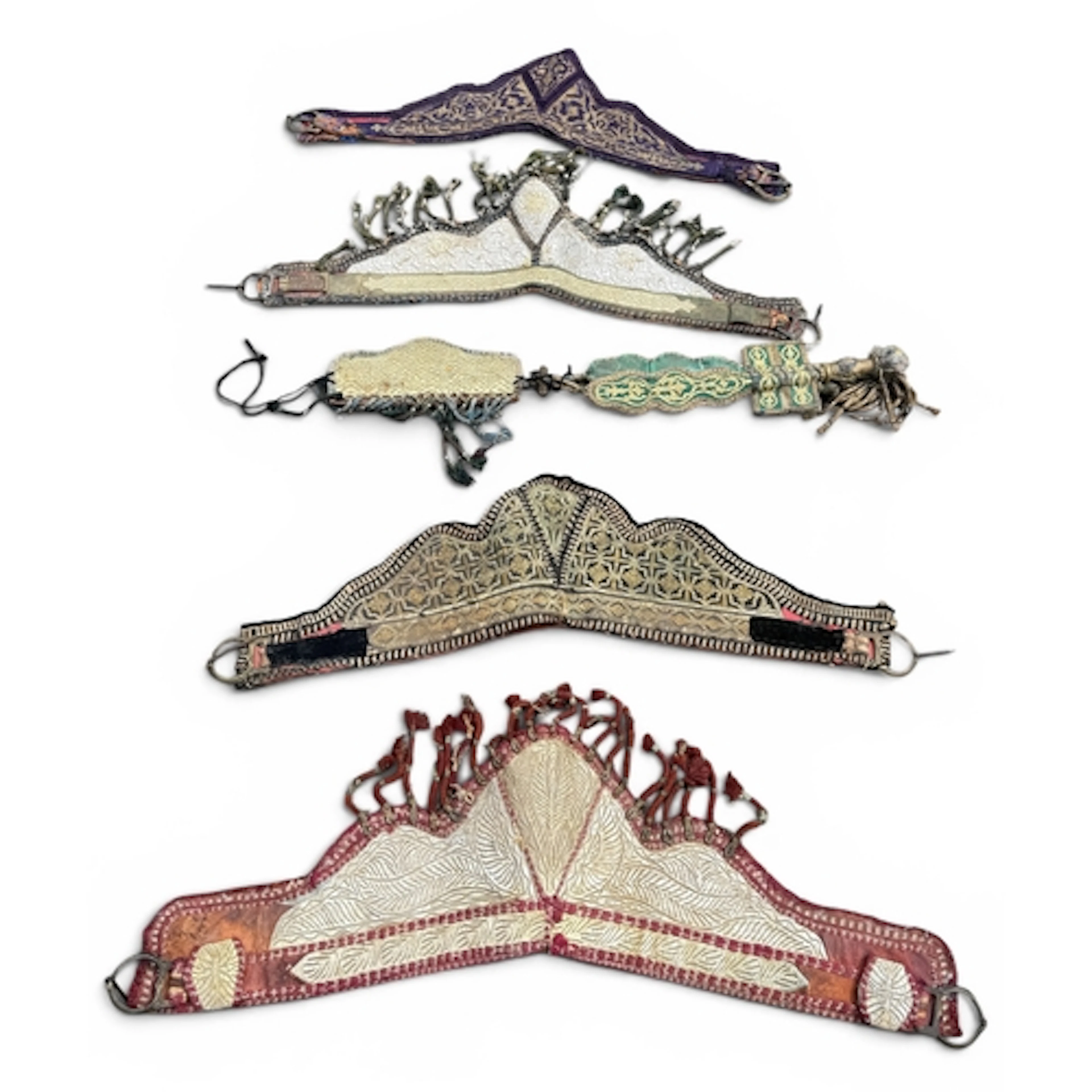 FIVE MOROCCAN HORSE BREASTPLATES / COLLARS, MID-20TH CENTURY...
