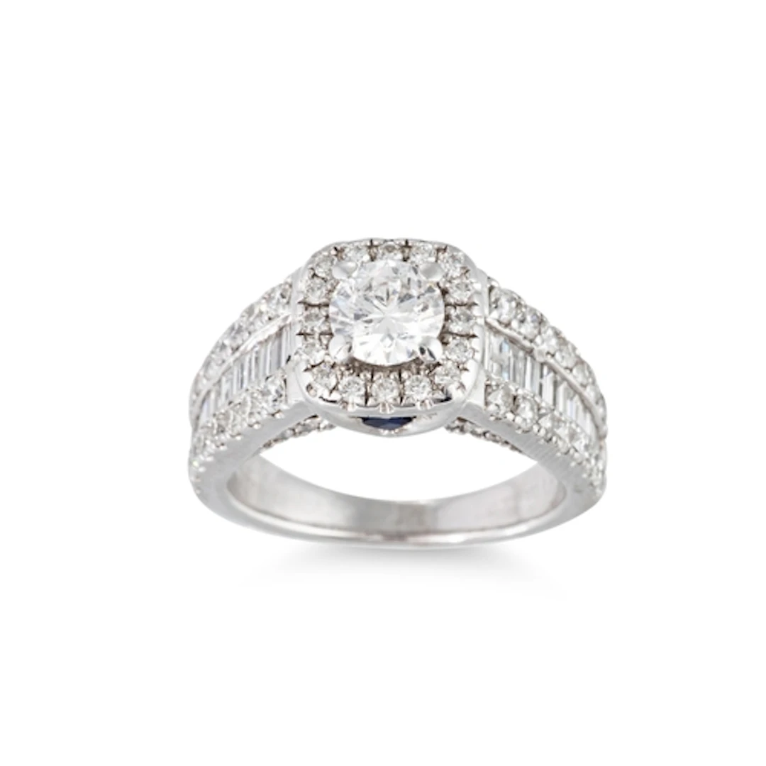A DIAMOND CLUSTER RING, the brilliant cut diamond to diamond...
