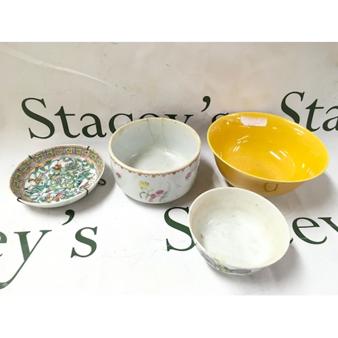 Chinese porcelain bowls and a dish including a yellow glaze ...