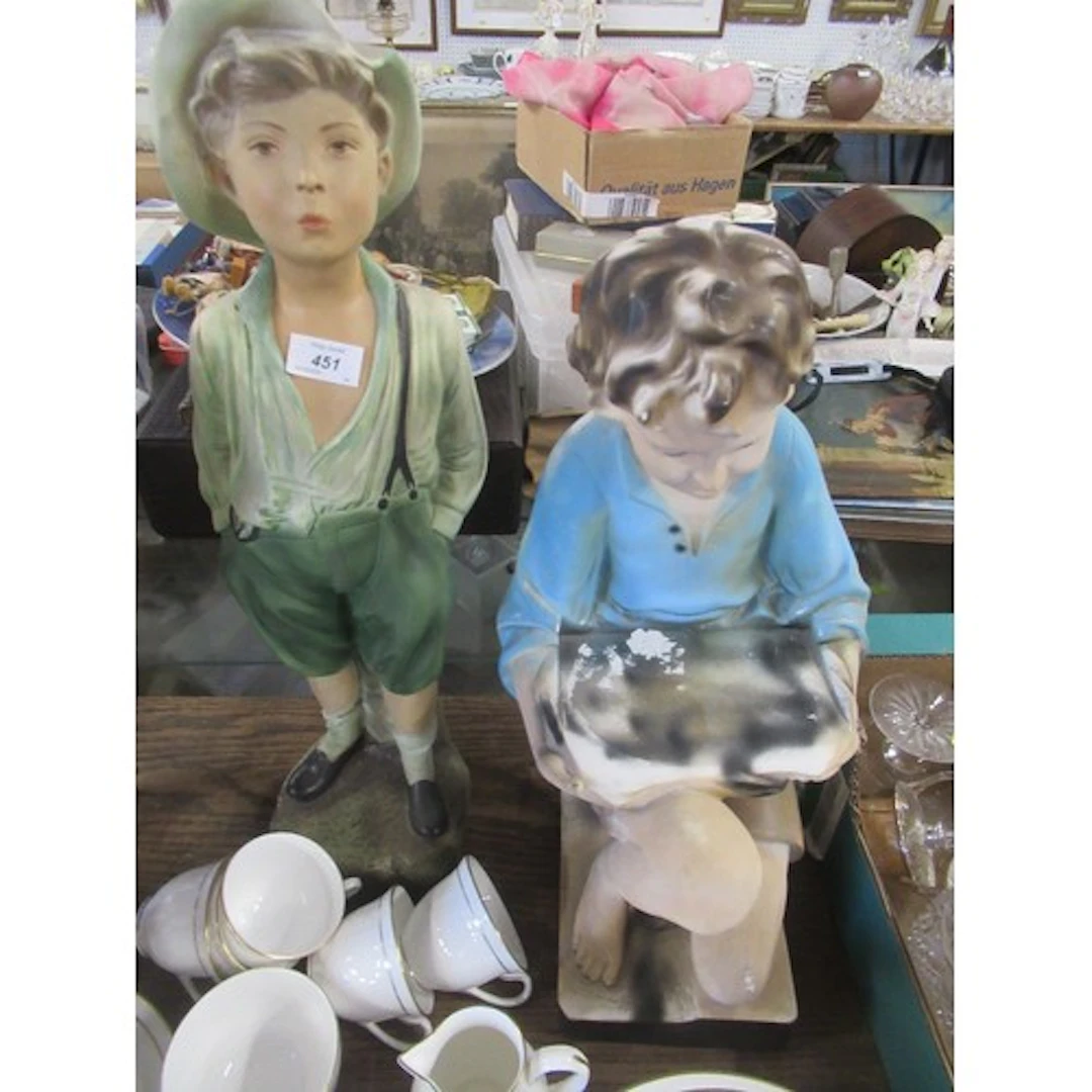 Two large 1920s models , heights 24ins and 20ins