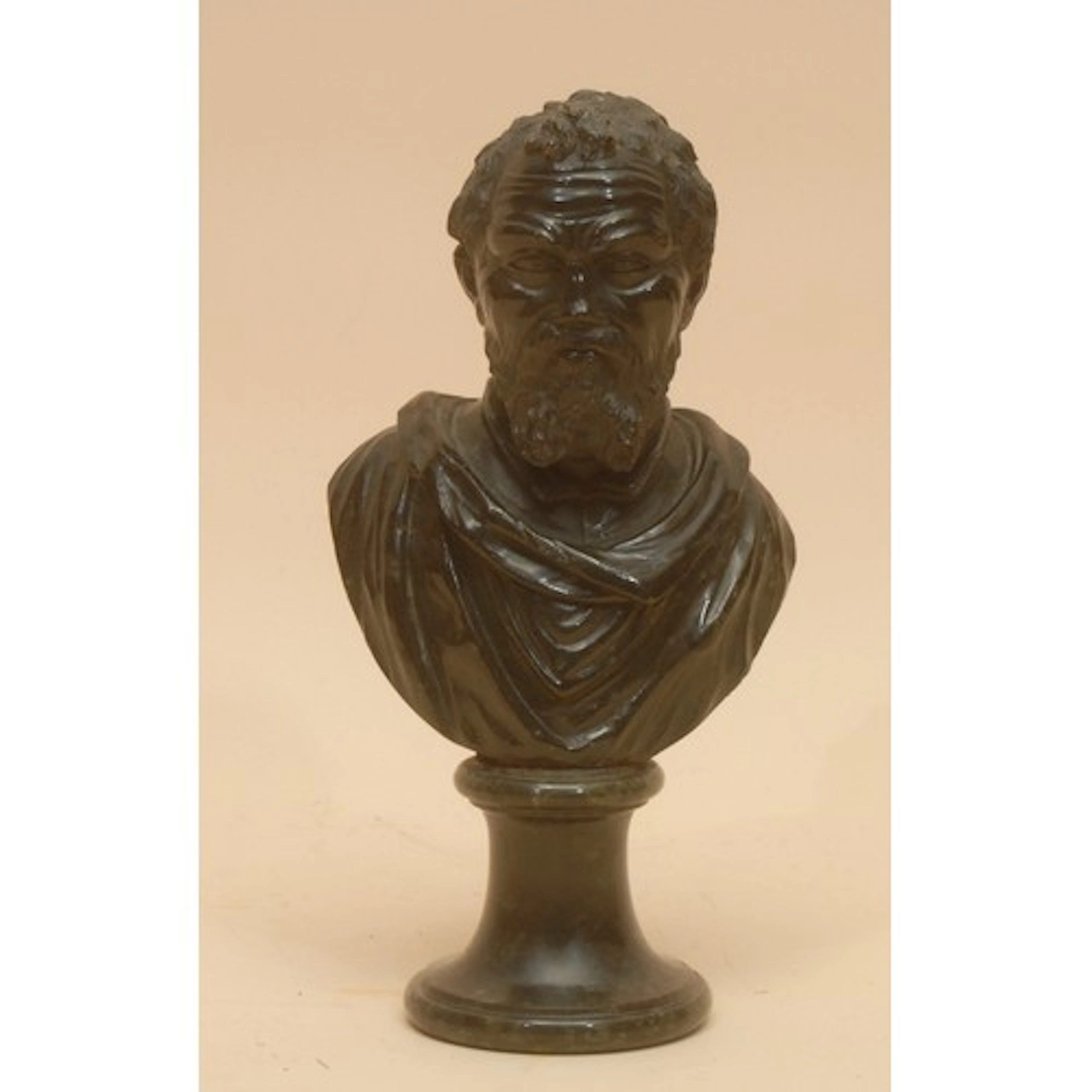 A 19th century Grand Tour serpentine bust, of Michelangelo (...