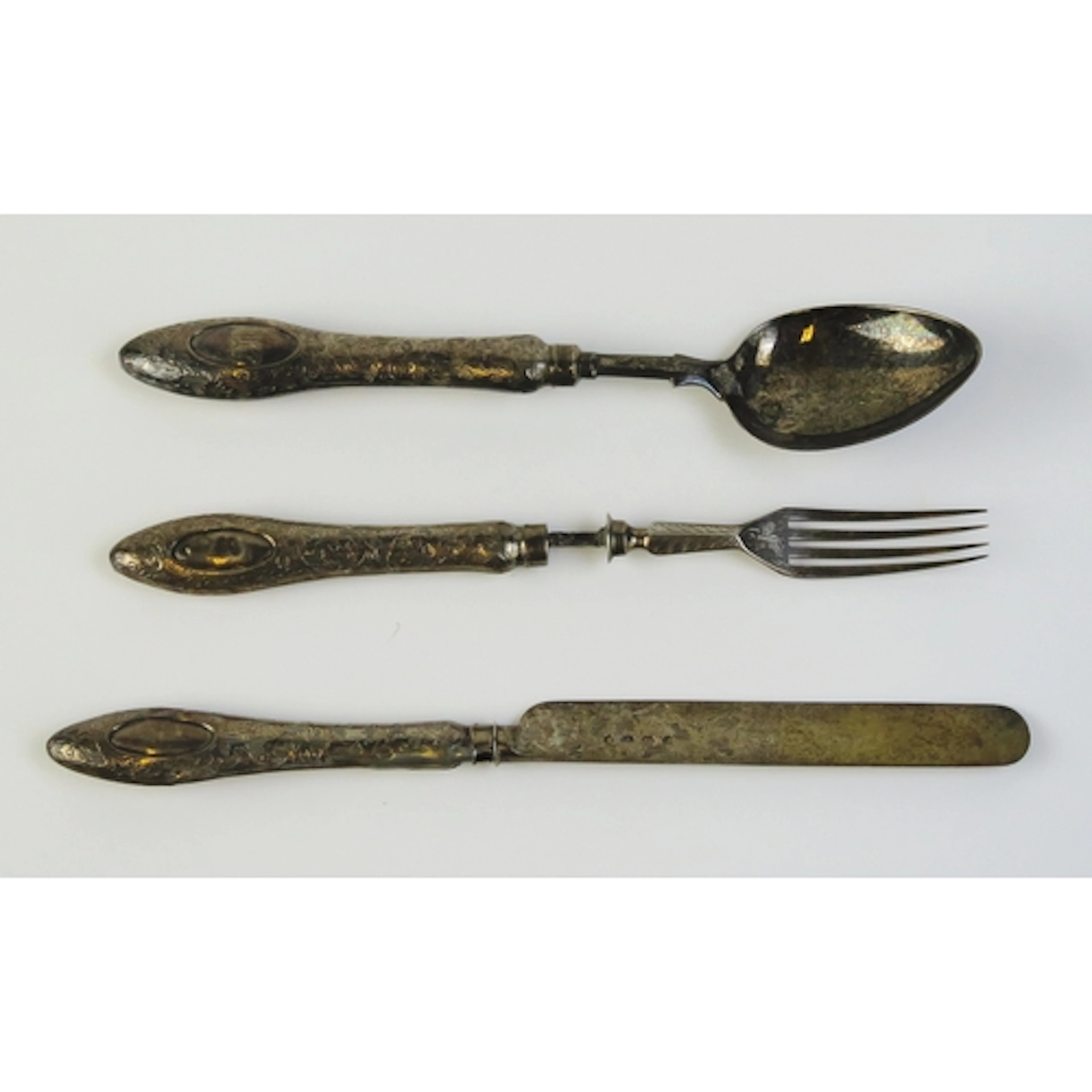 A silver three piece christening set maker Hilliard & Thomas...