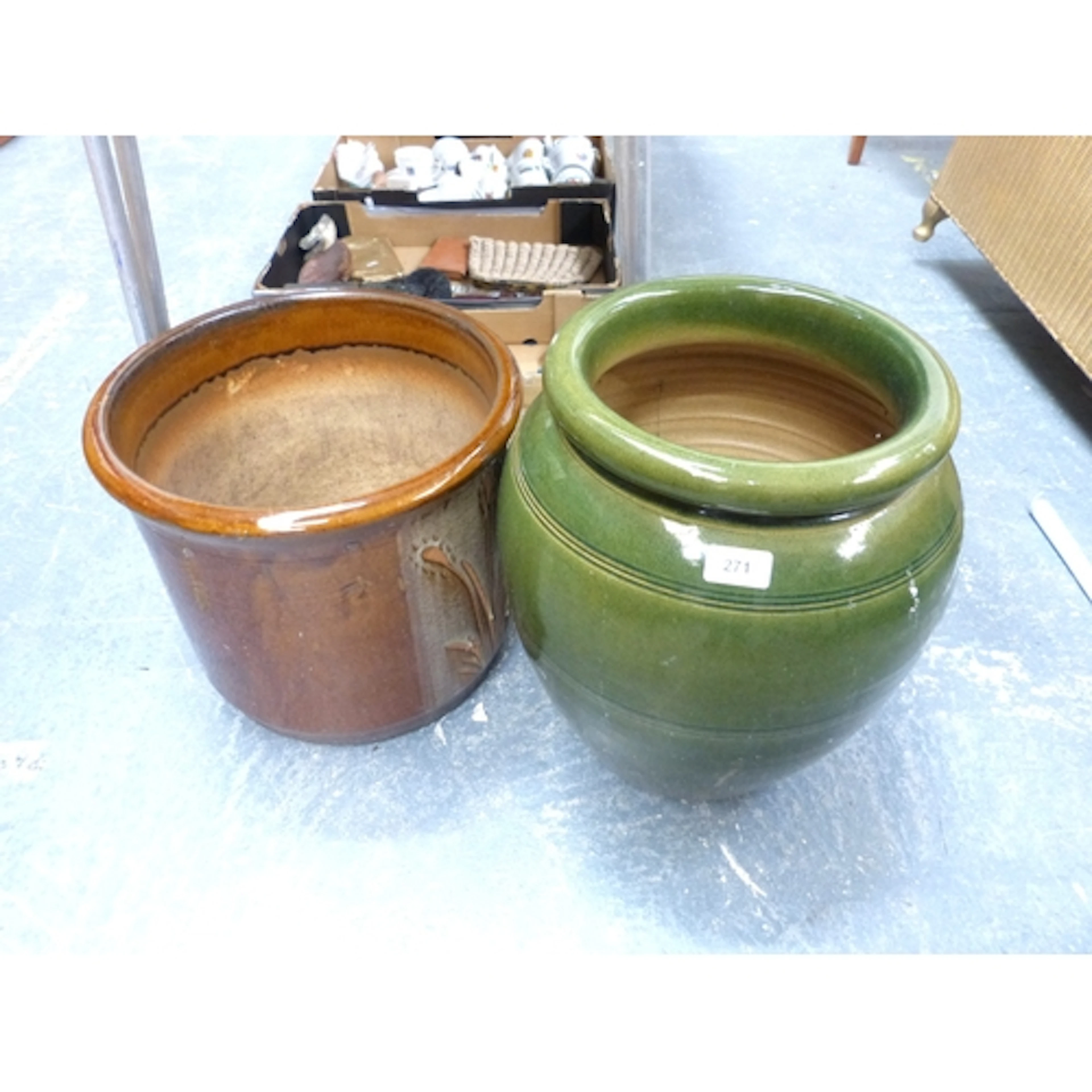 Two large ceramic garden planters.