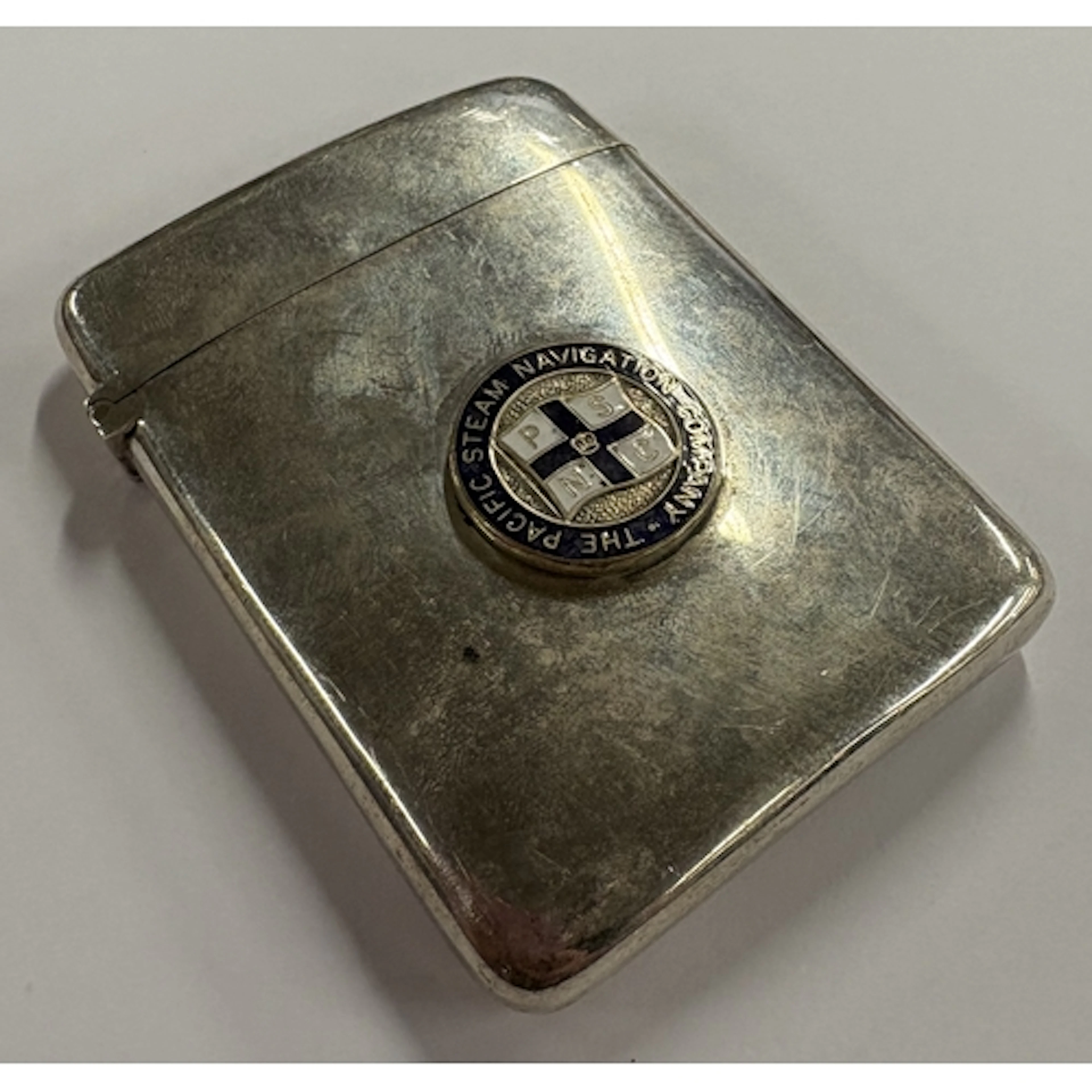 A Victorian silver and enamelled card case. London 1886. App...