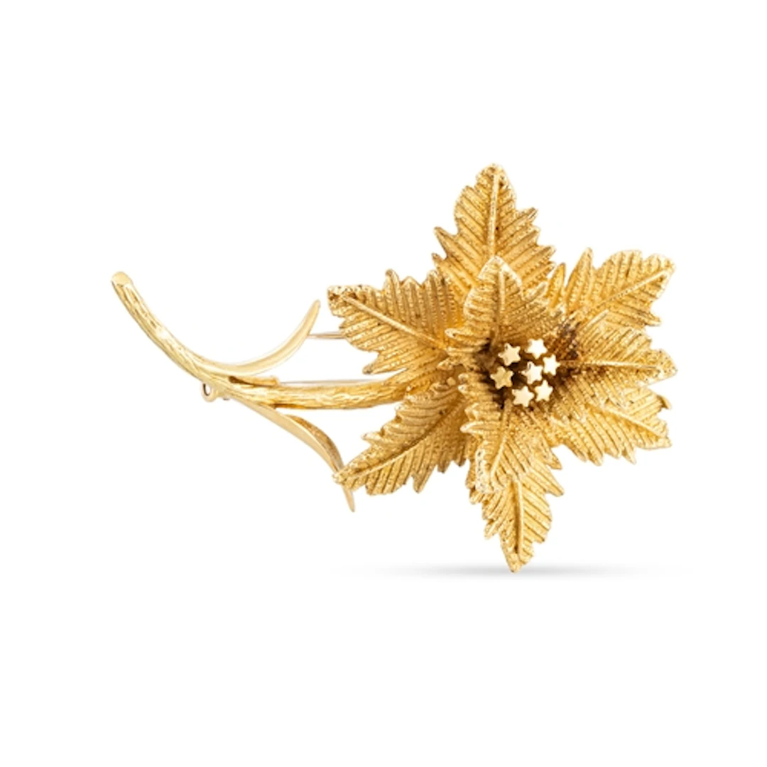 A MID-CENTURY HERMÉS FLOWER BROOCH/FUR CLIP, in 18ct yellow ...