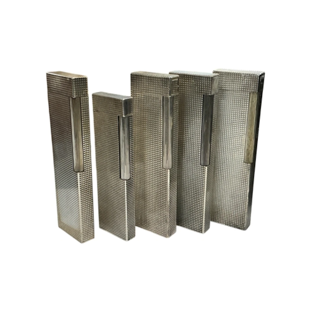 S.T. Dupont, five Briquet table lighters, each stamped to th...