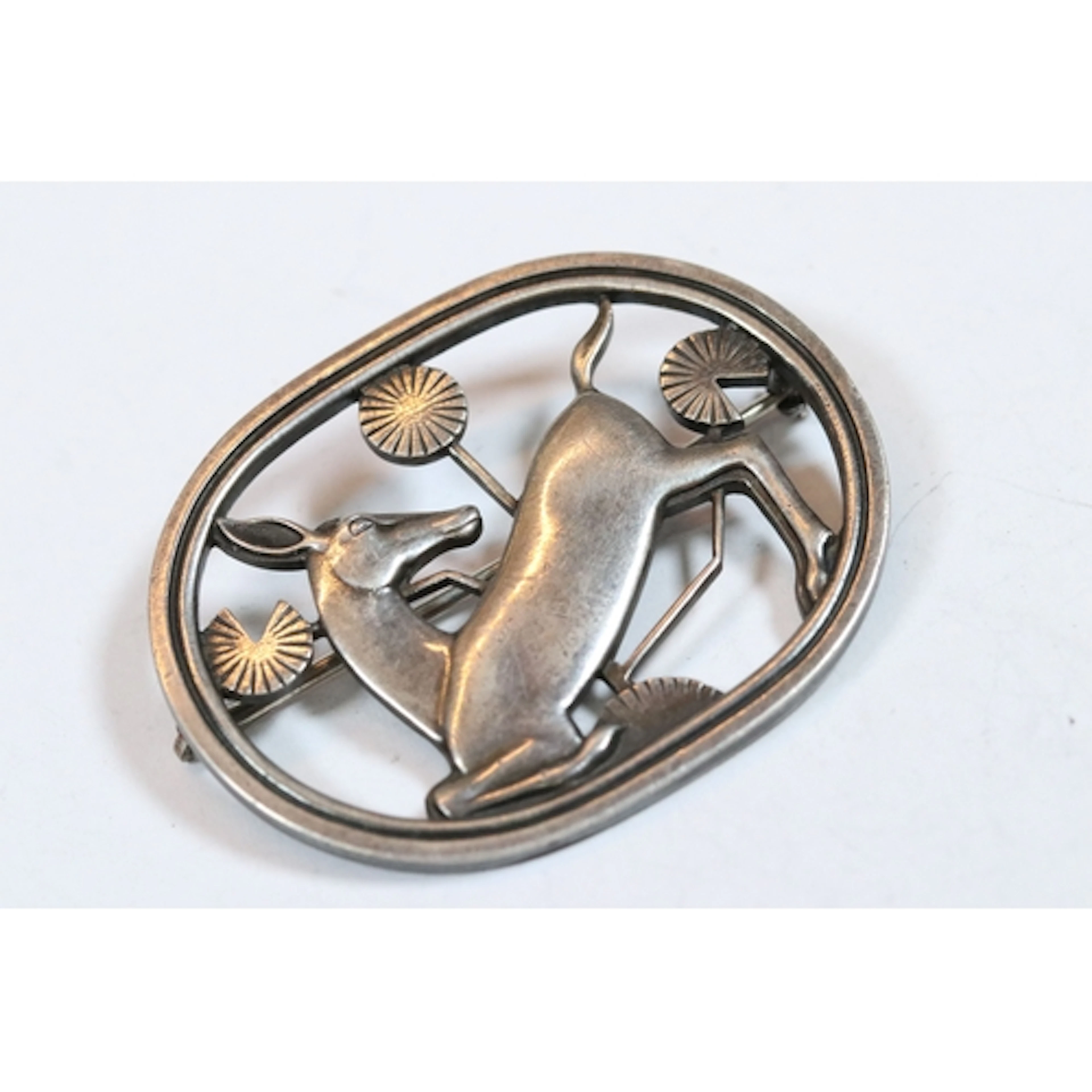 A fully hallmarked sterling silver Georg Jensen kneeling dee...