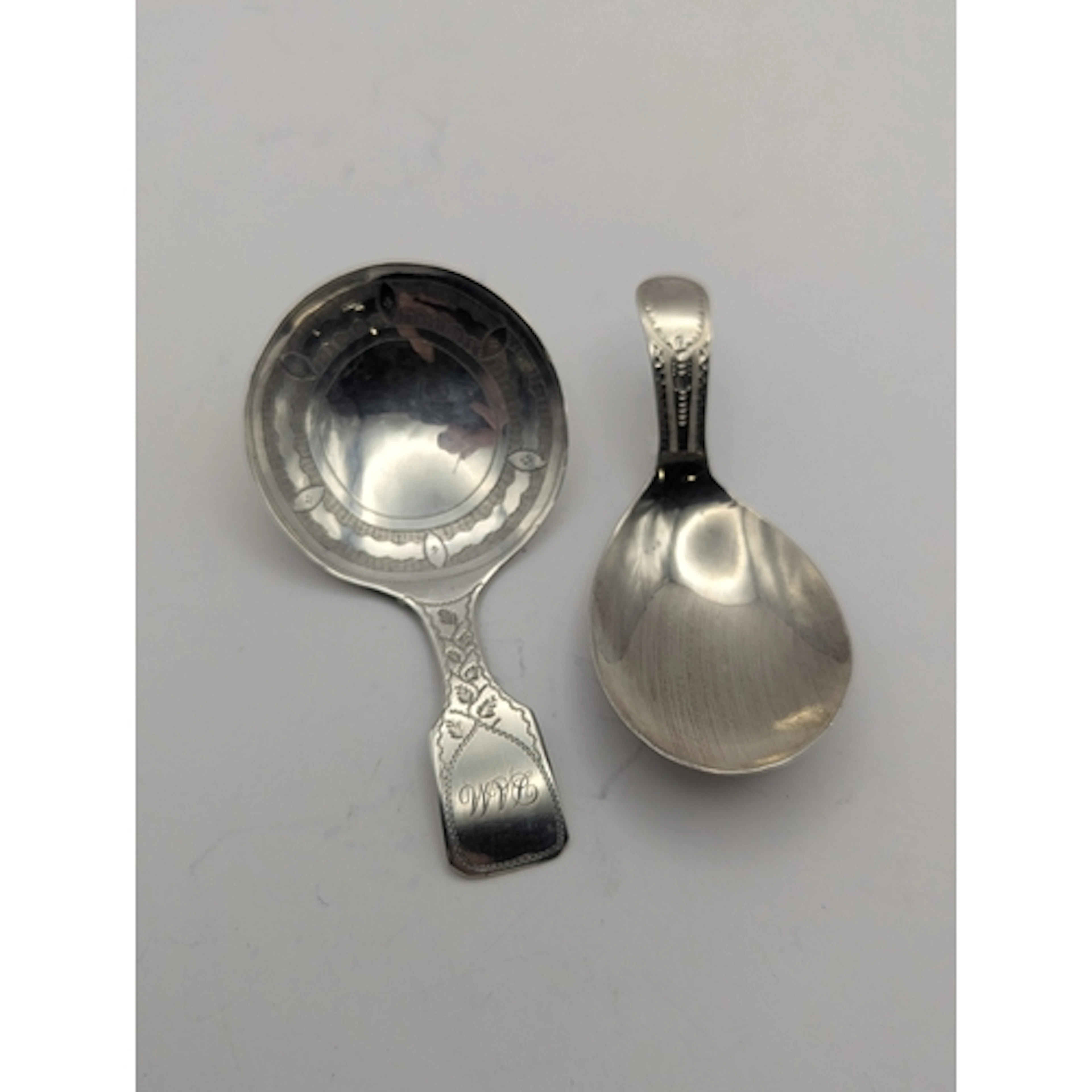 Two George III silver caddy spoons, one example hallmarked L...