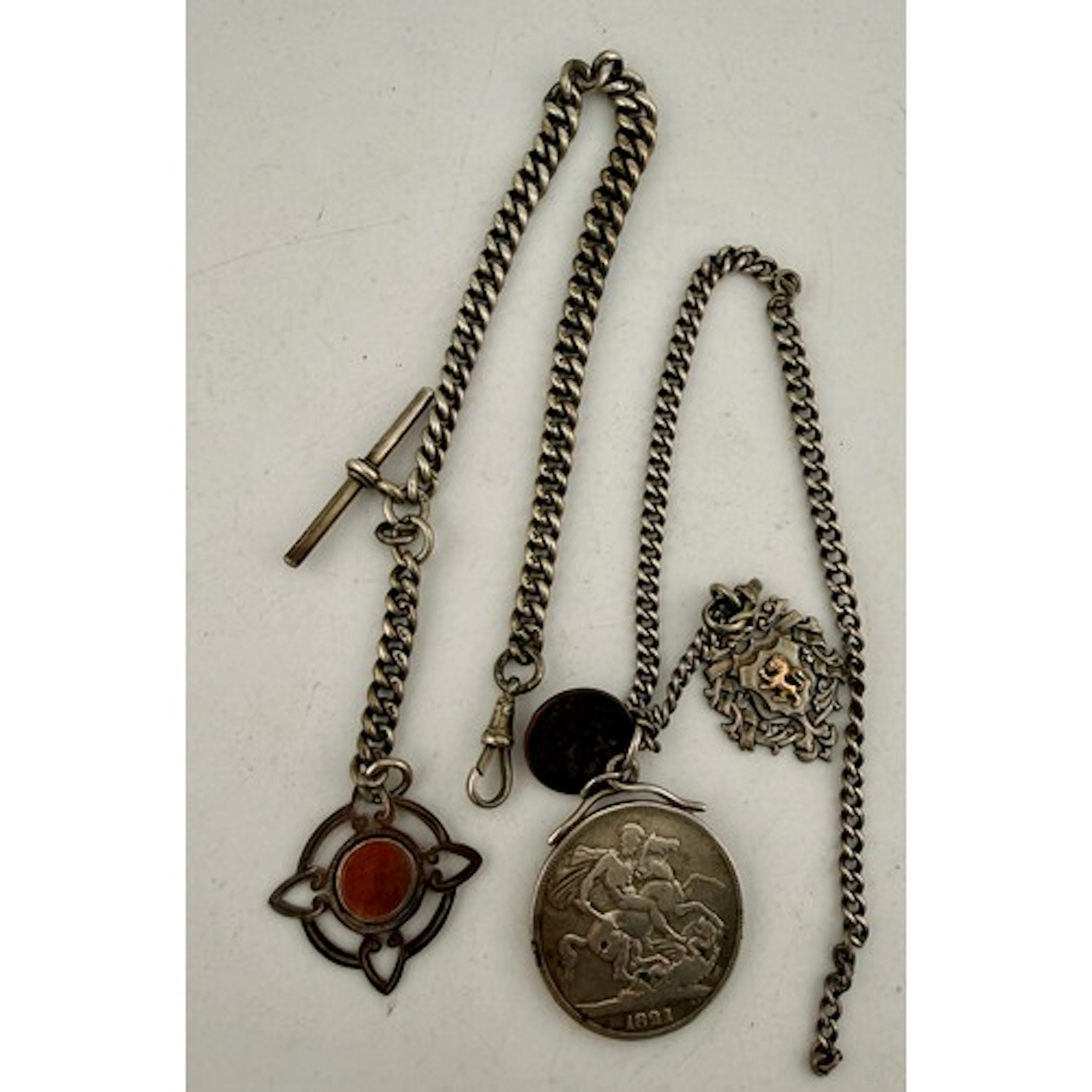 Two hallmarked silver pocket watches chains, one with 1821 c...