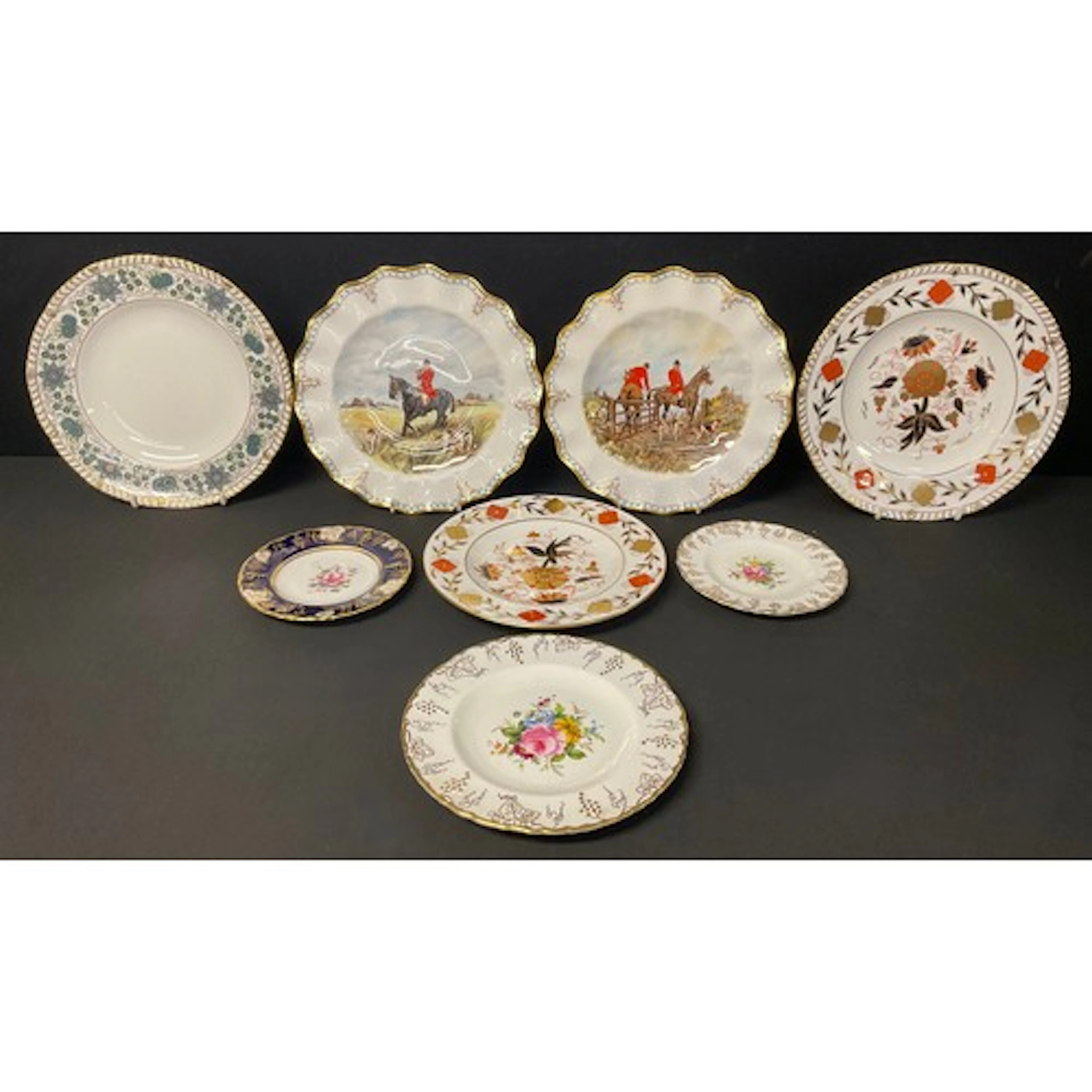 A pair of Royal Crown Derby shaped circular plates, printed ...