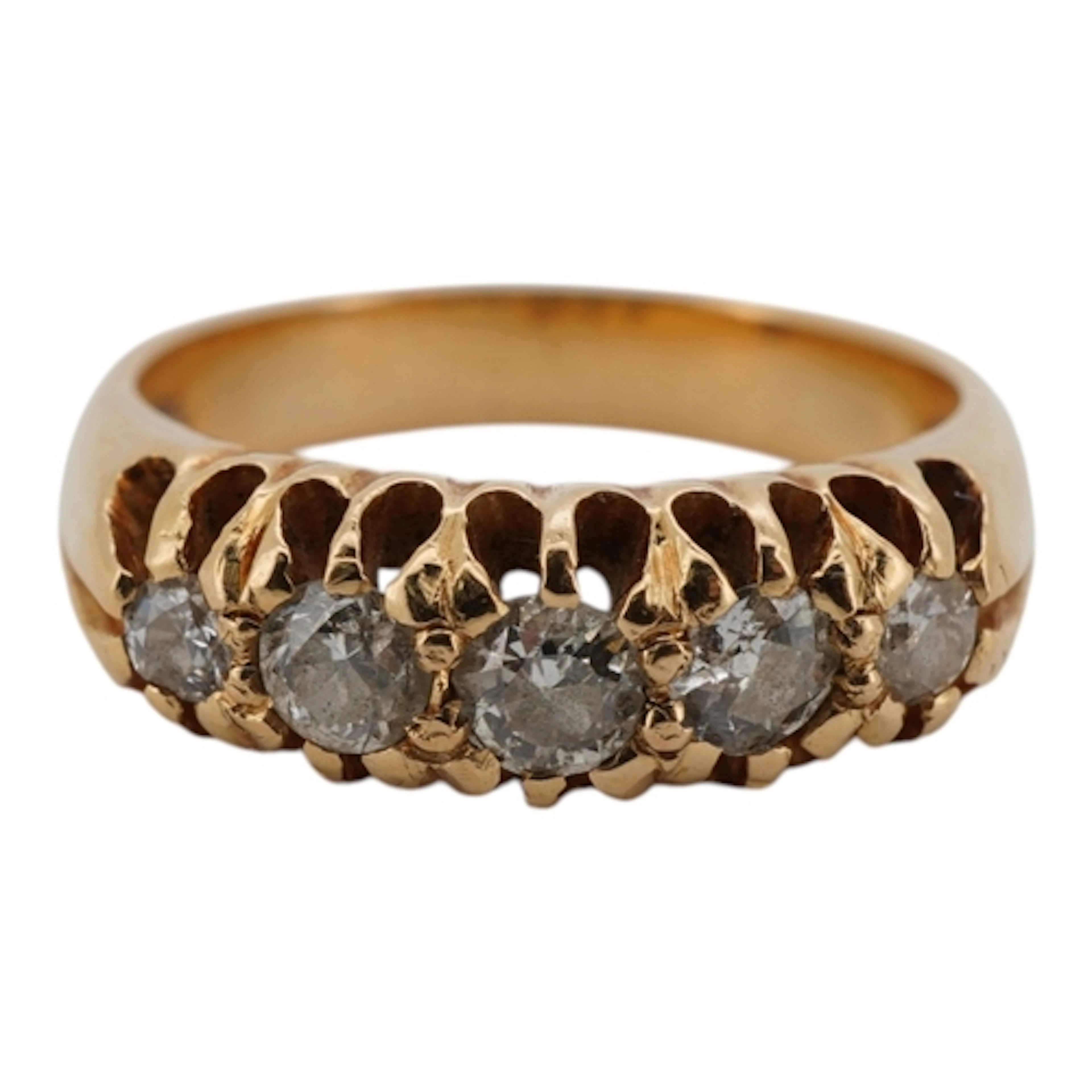A yellow metal and graduated claw set five stone diamond set...