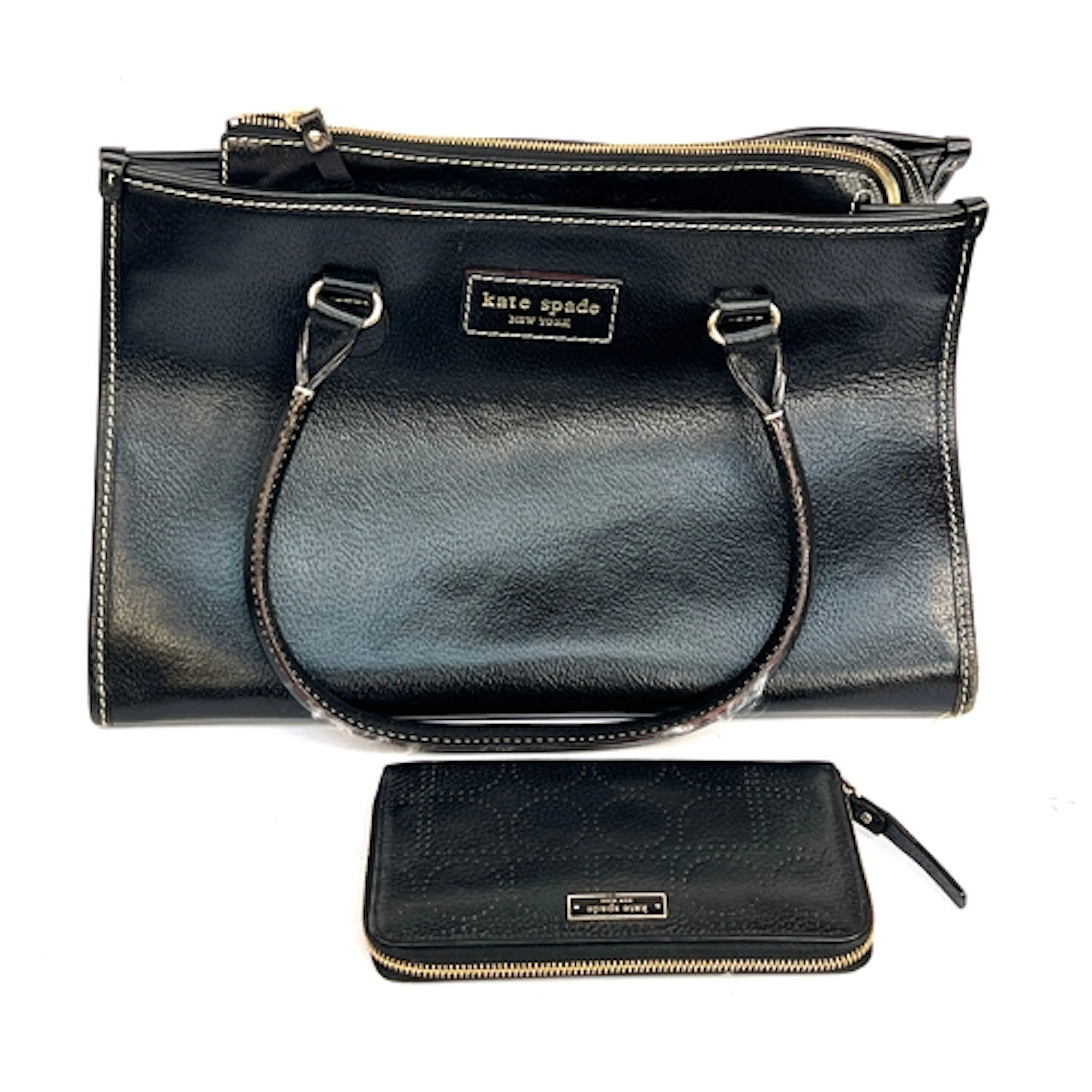 A Kate Spade New York black leather handbag, 37cmW, and purs...