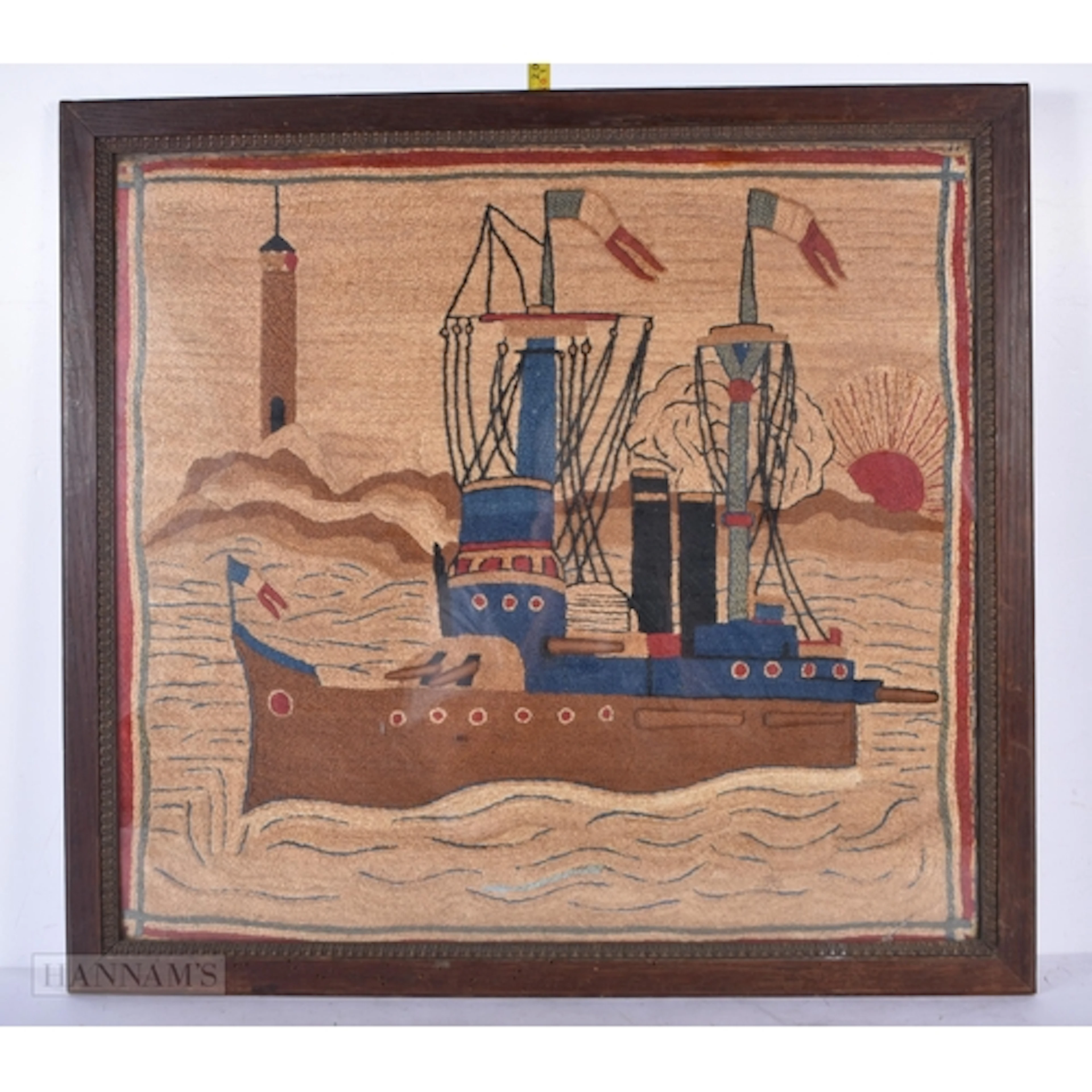 A framed 19th Century sailors wool work embroidery depictin...