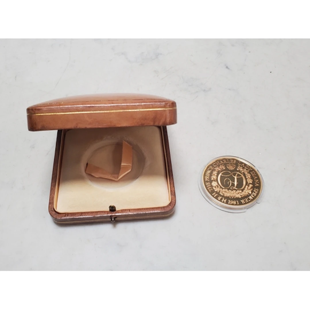 A 22ct gold Commemorative Medal celebrating Prince Charles a...
