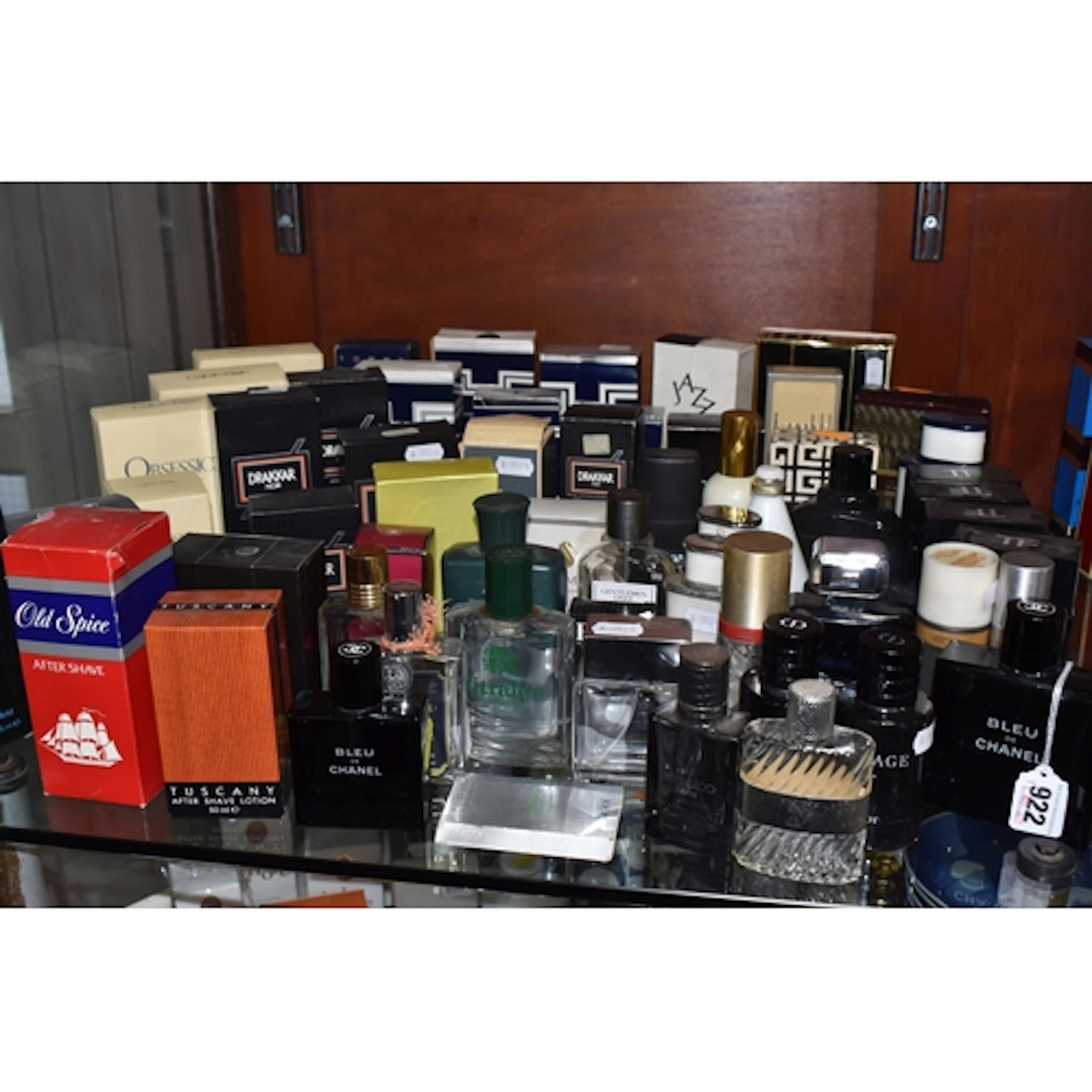 A COLLECTION OF MOSTLY EMPTY MEN'S FRAGRANCE BOTTLES, to inc...