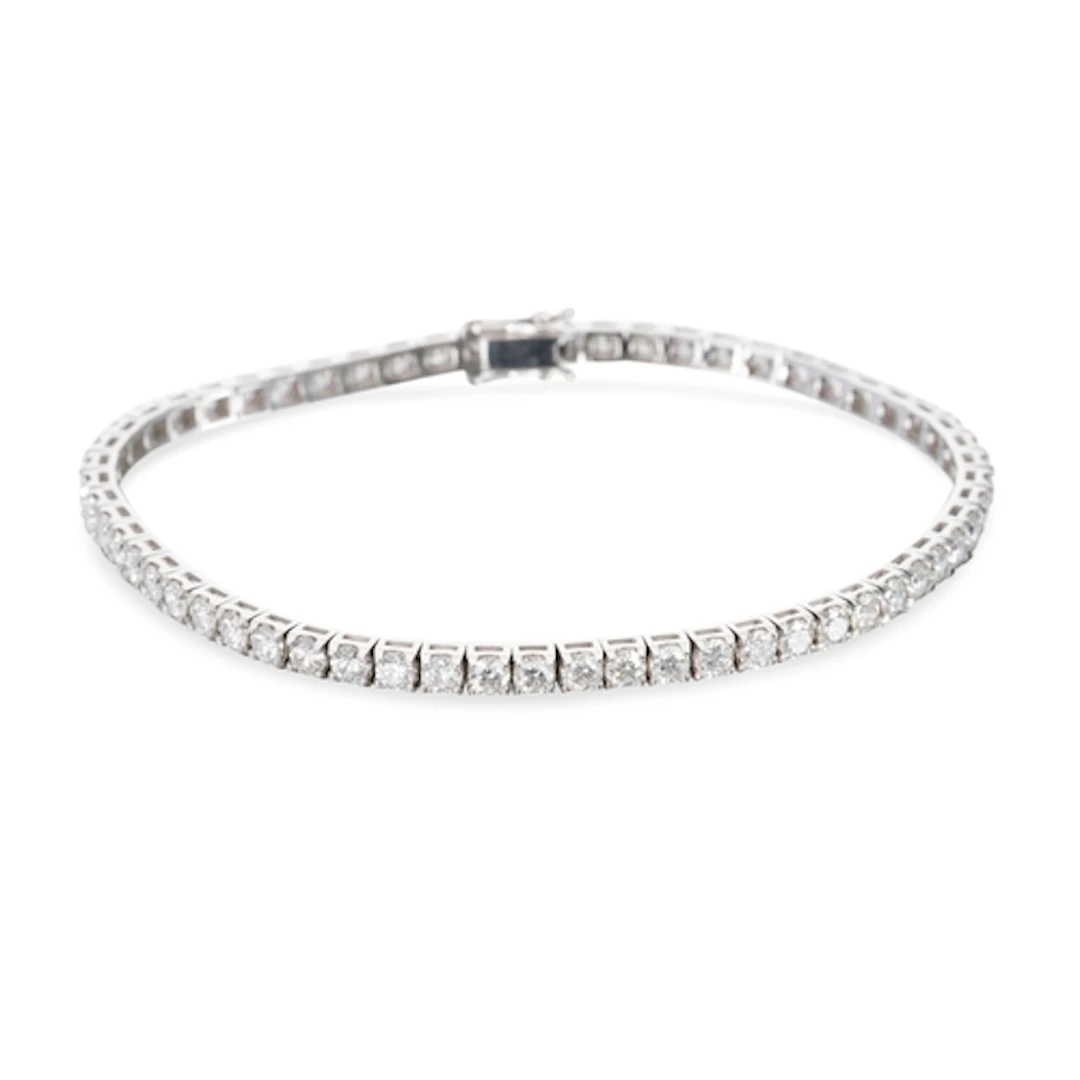 A DIAMOND LINE BRACELET, the round brilliant cut diamonds mo...