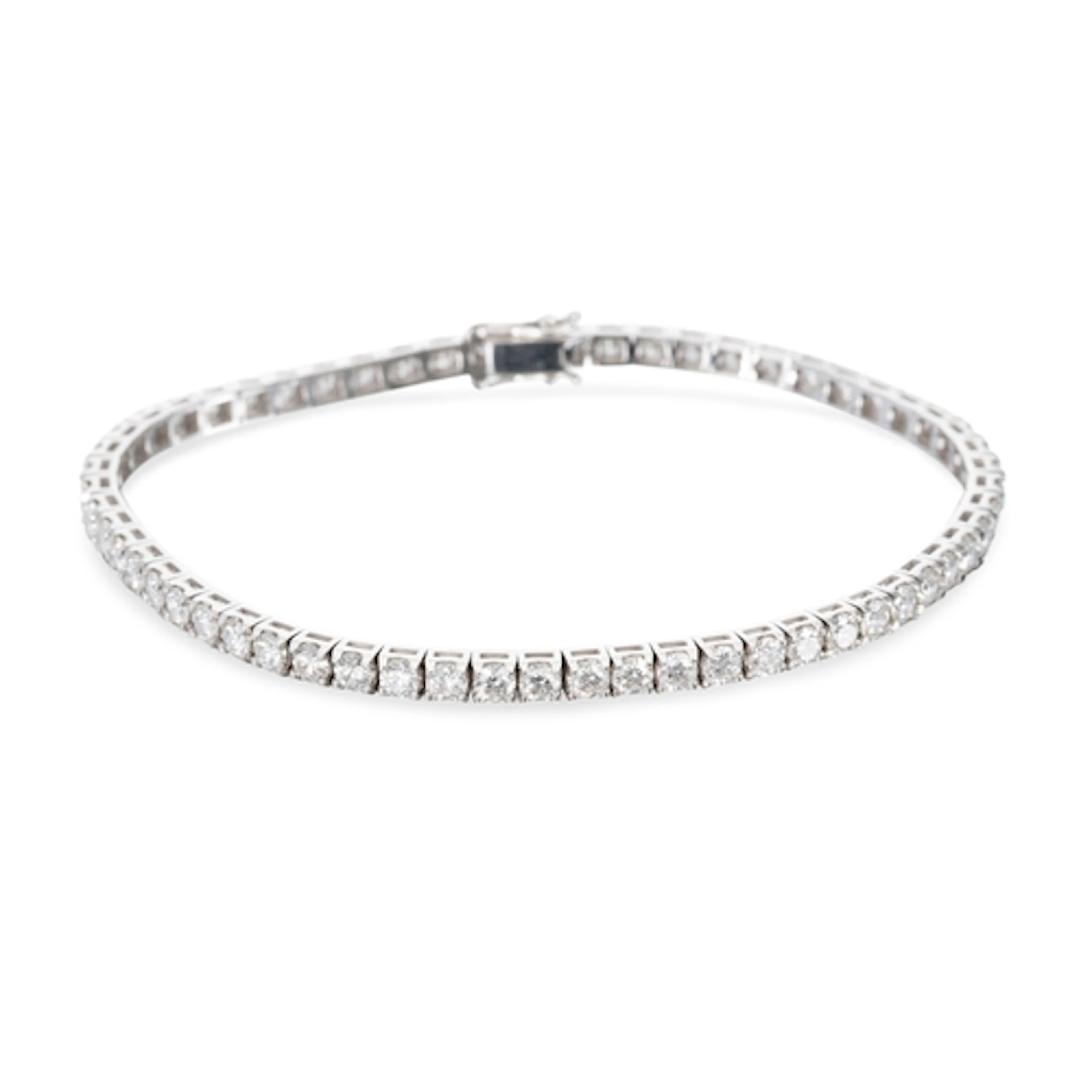 A DIAMOND LINE BRACELET, the round brilliant cut diamonds mo...