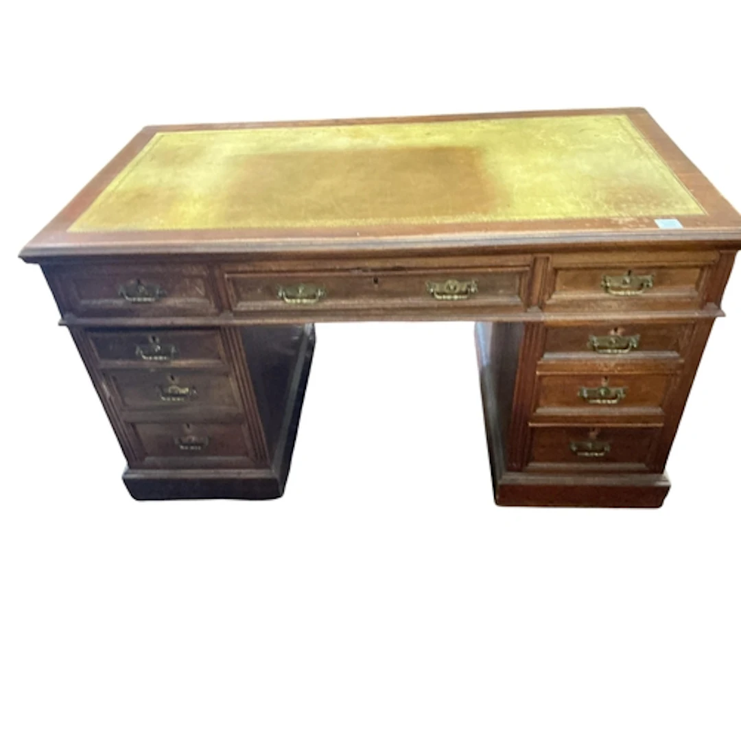 An early 20th century walnut pedestal desk, width 138cm, dep...