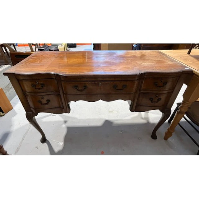 Antique serpentine fronted five drawer desk with cabriole le...