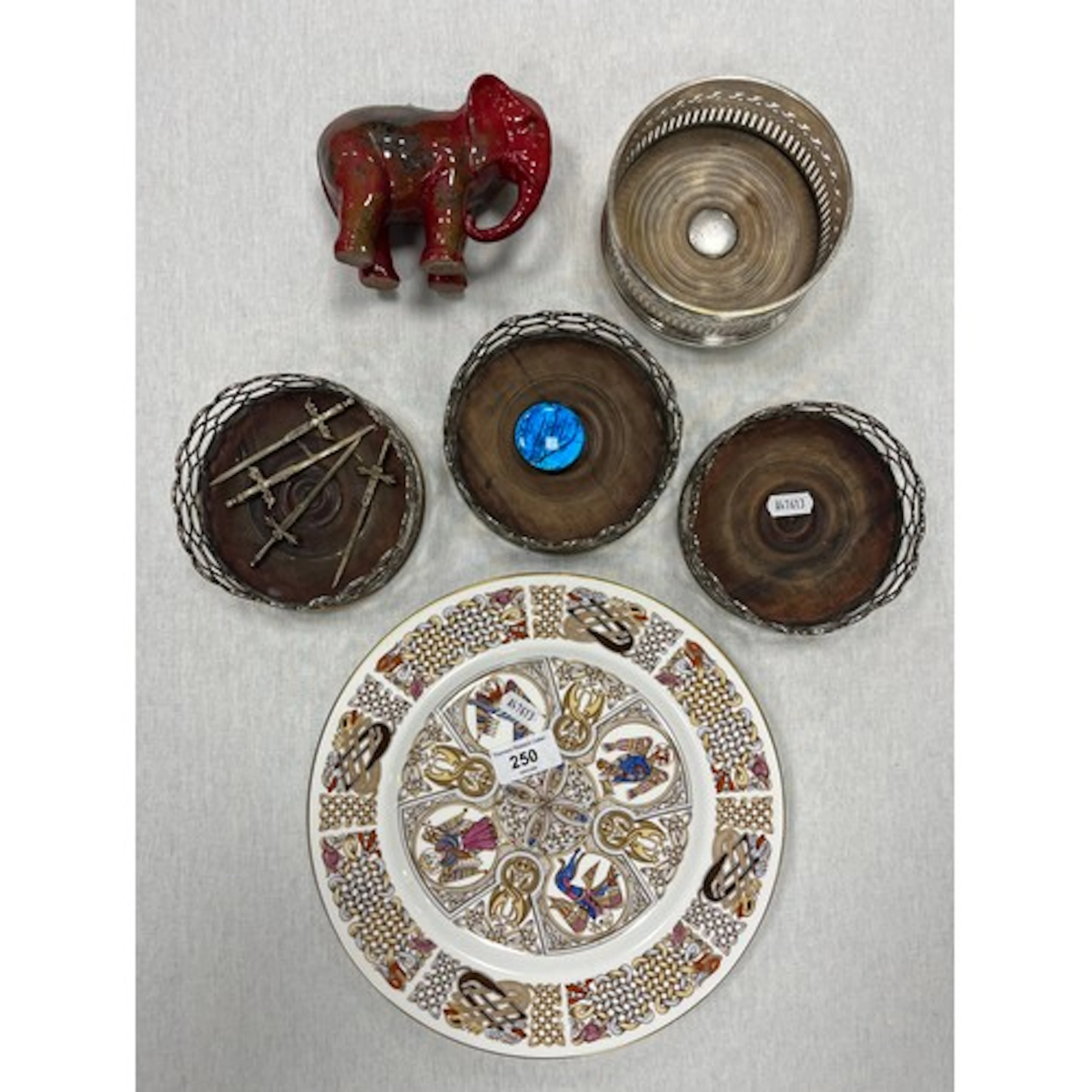Collection of EP wine coasters, red elephant and a Spode pla...