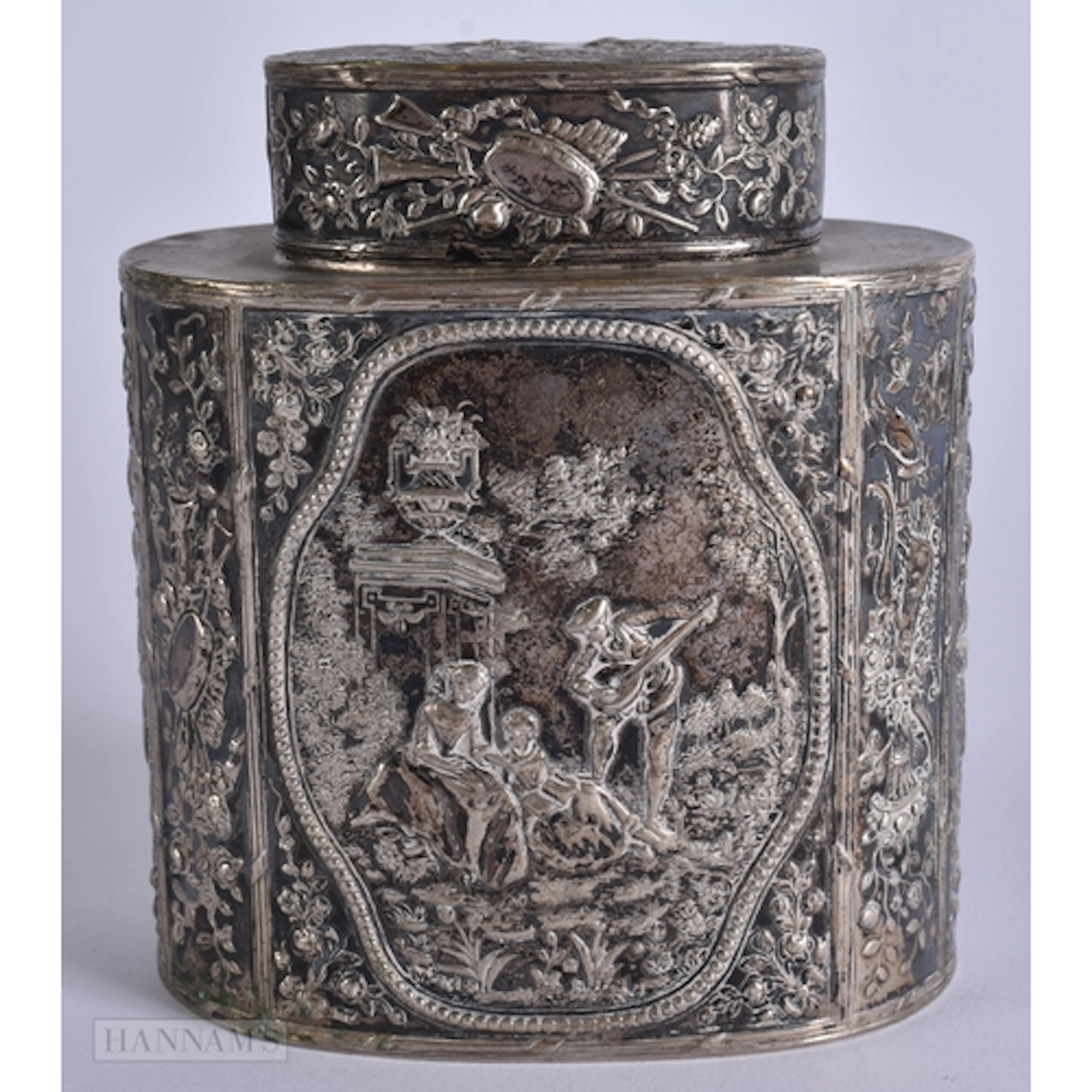 A FINE 19TH CENTURY CONTINENTAL SILVER TEA CADDY decorated w...