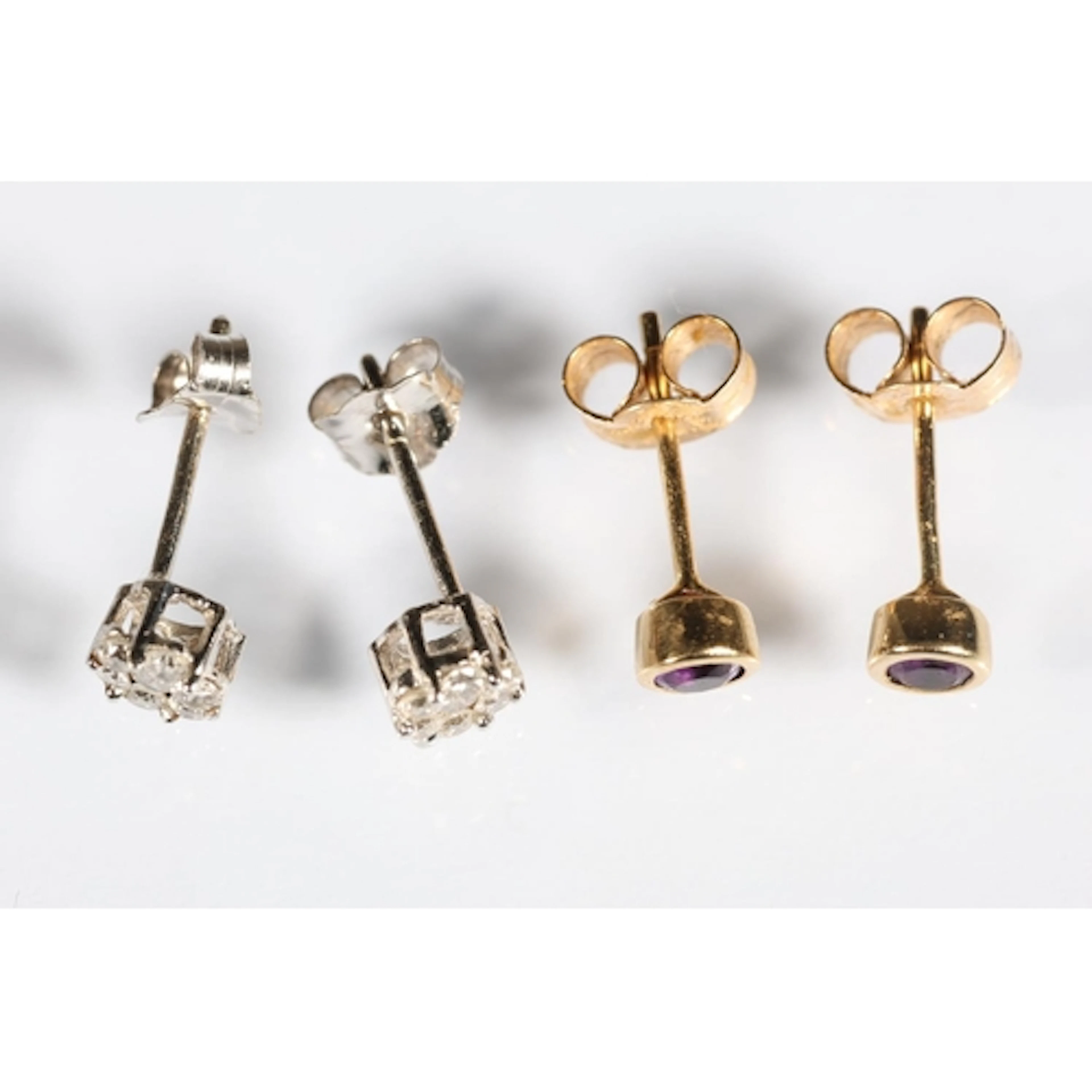 Pair of white gold and diamond ear studs, unmarked, 0.5g, an...