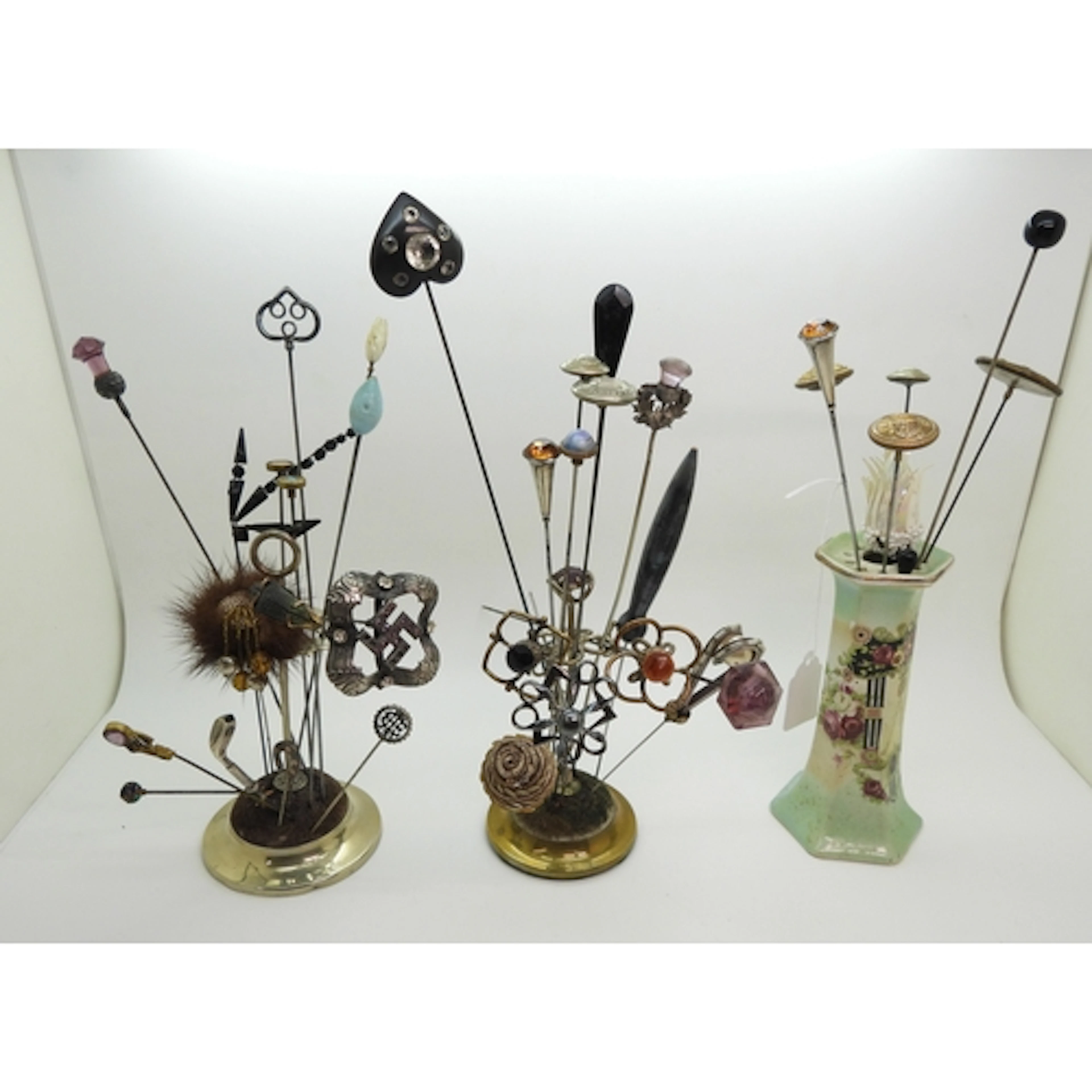 A collection of hat pins, to include two by Charles Horner, ...