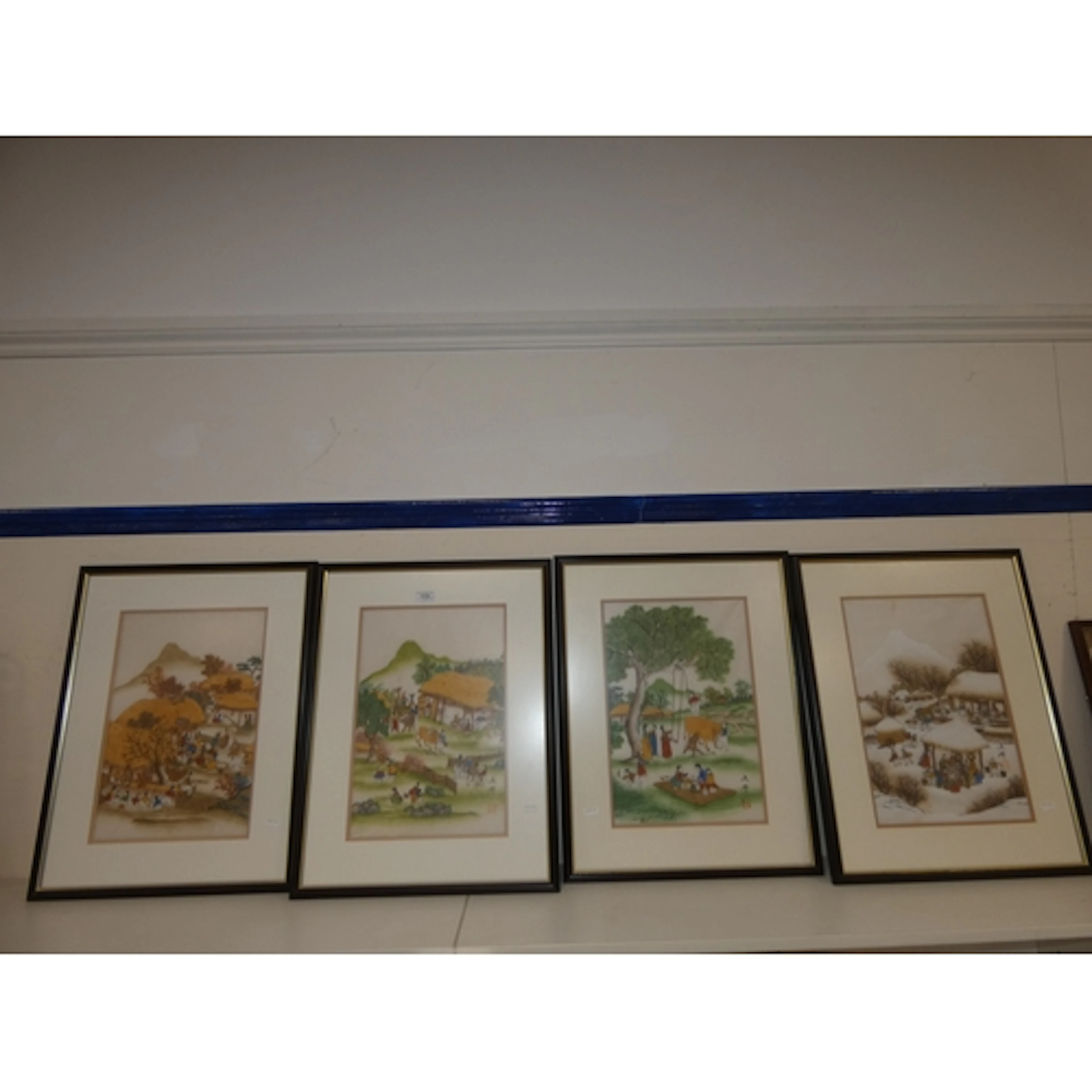 Set of four Korean folk art pictures (minhwa) featuring vill...