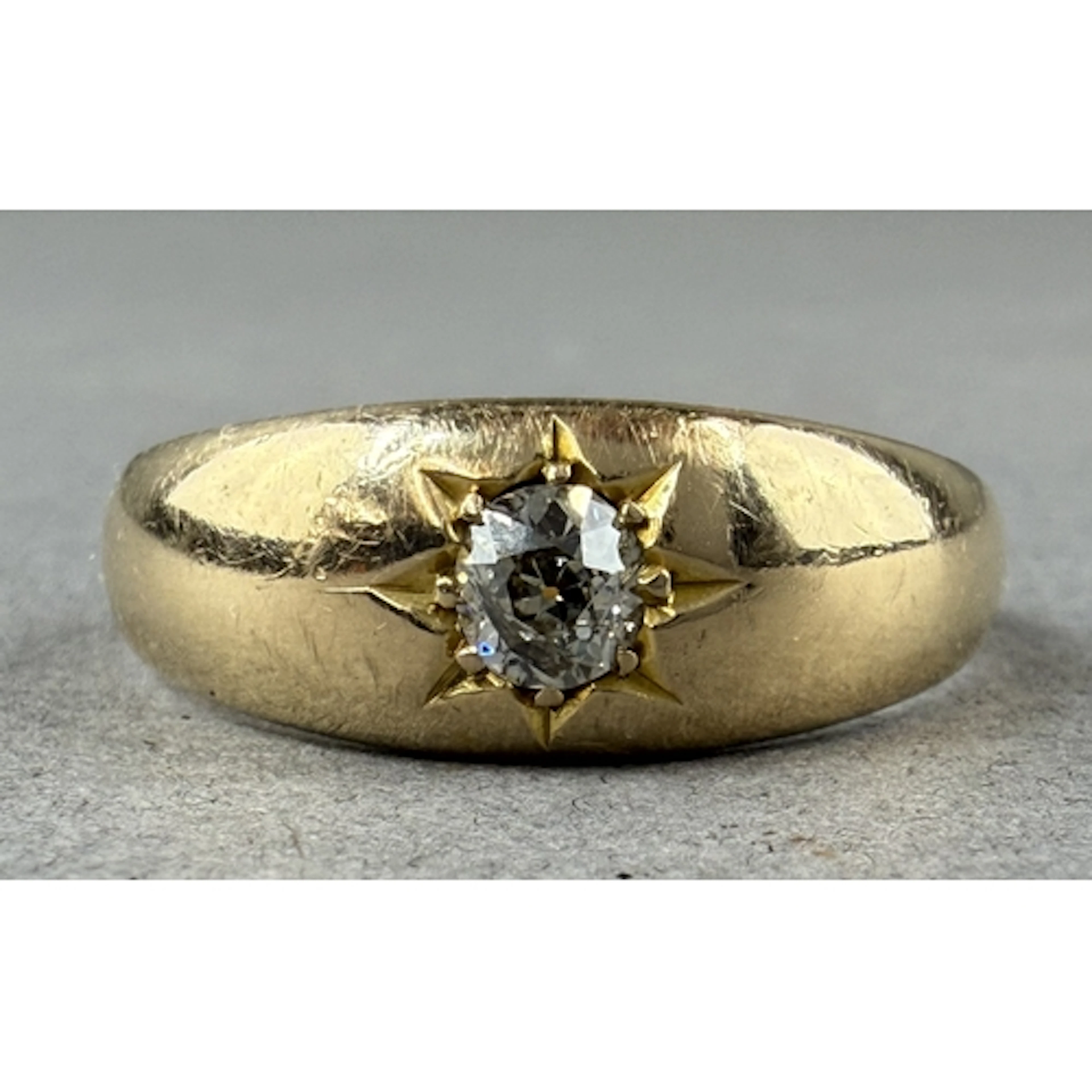 Jewellery: a late Victorian 18ct yellow gold ring gypsy set ...