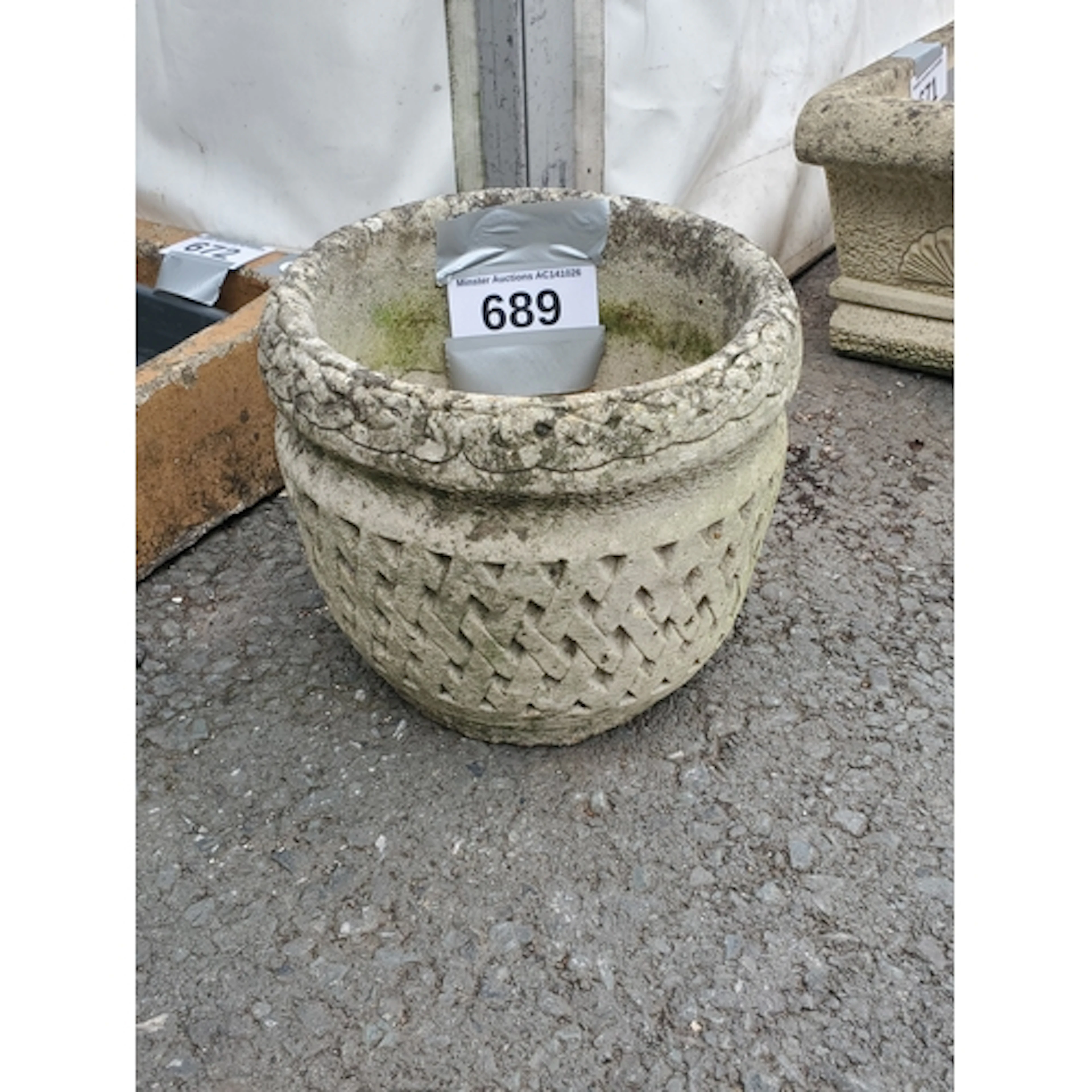 A Planter with interlaced designs