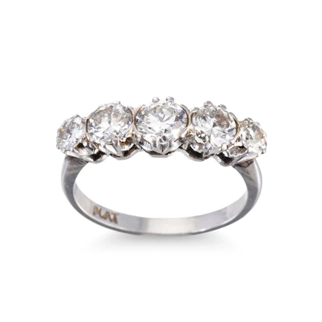 A VINTAGE FIVE STONE DIAMOND RING, the transitional cut grad...