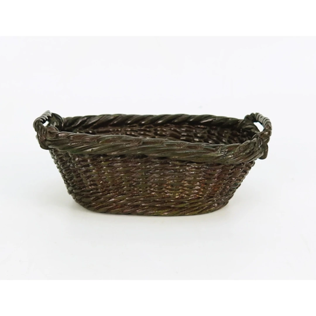 A bronze model of a miniature wicker basket, 13cm wide